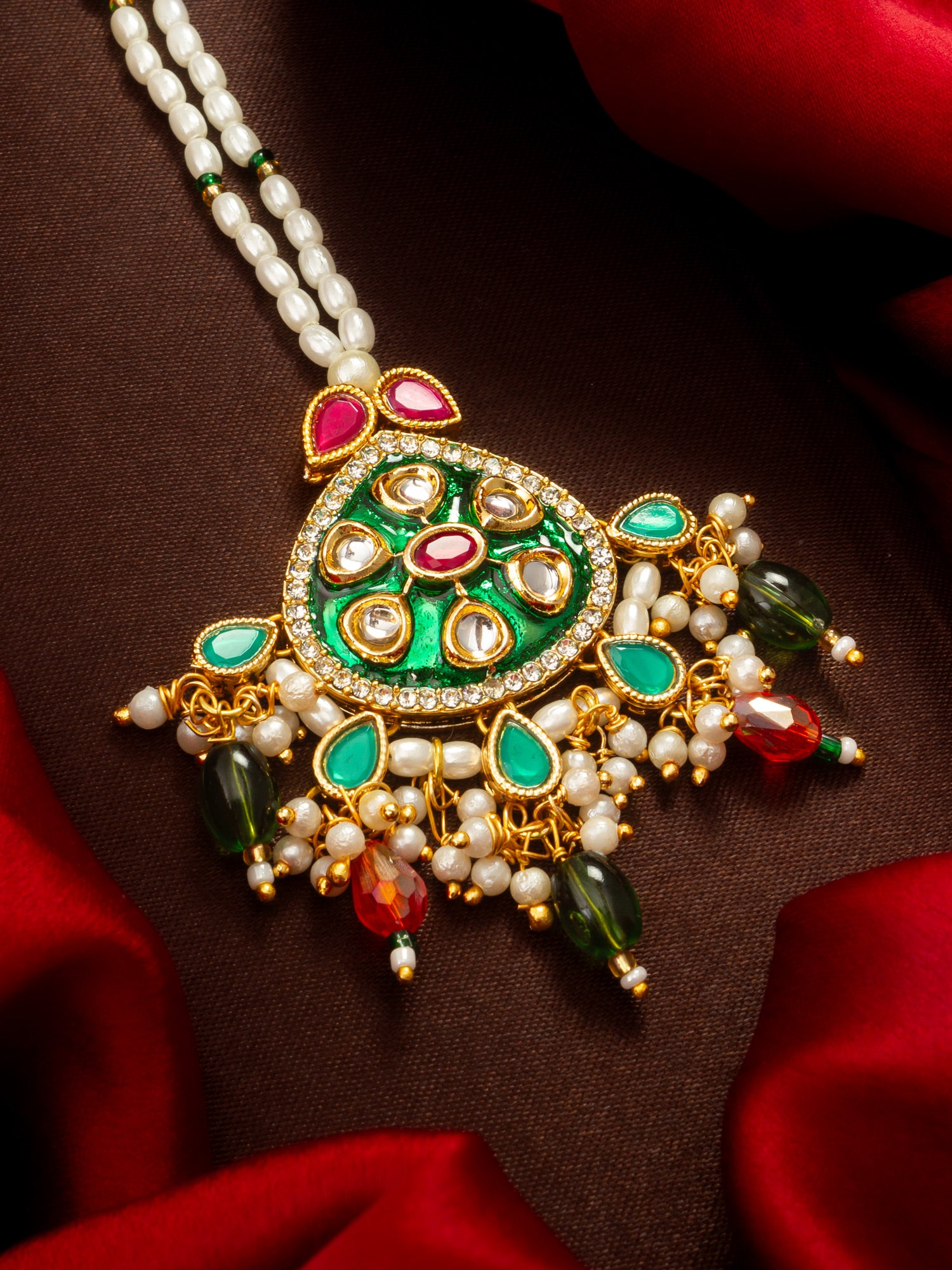 Aadita Gold Plated Kundan Mangtika with Green Meenakari Pendant and Pearl Bead Chain