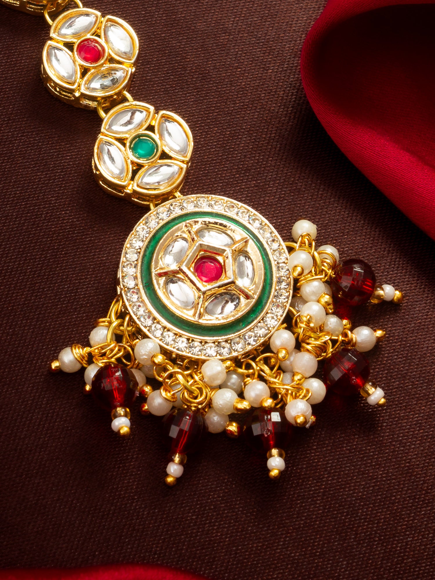 Aadita Gold Plated Linked Kundan Medallion Chain Mangtika with Circular Meenakari Pendant and Garnet Bead Fringe