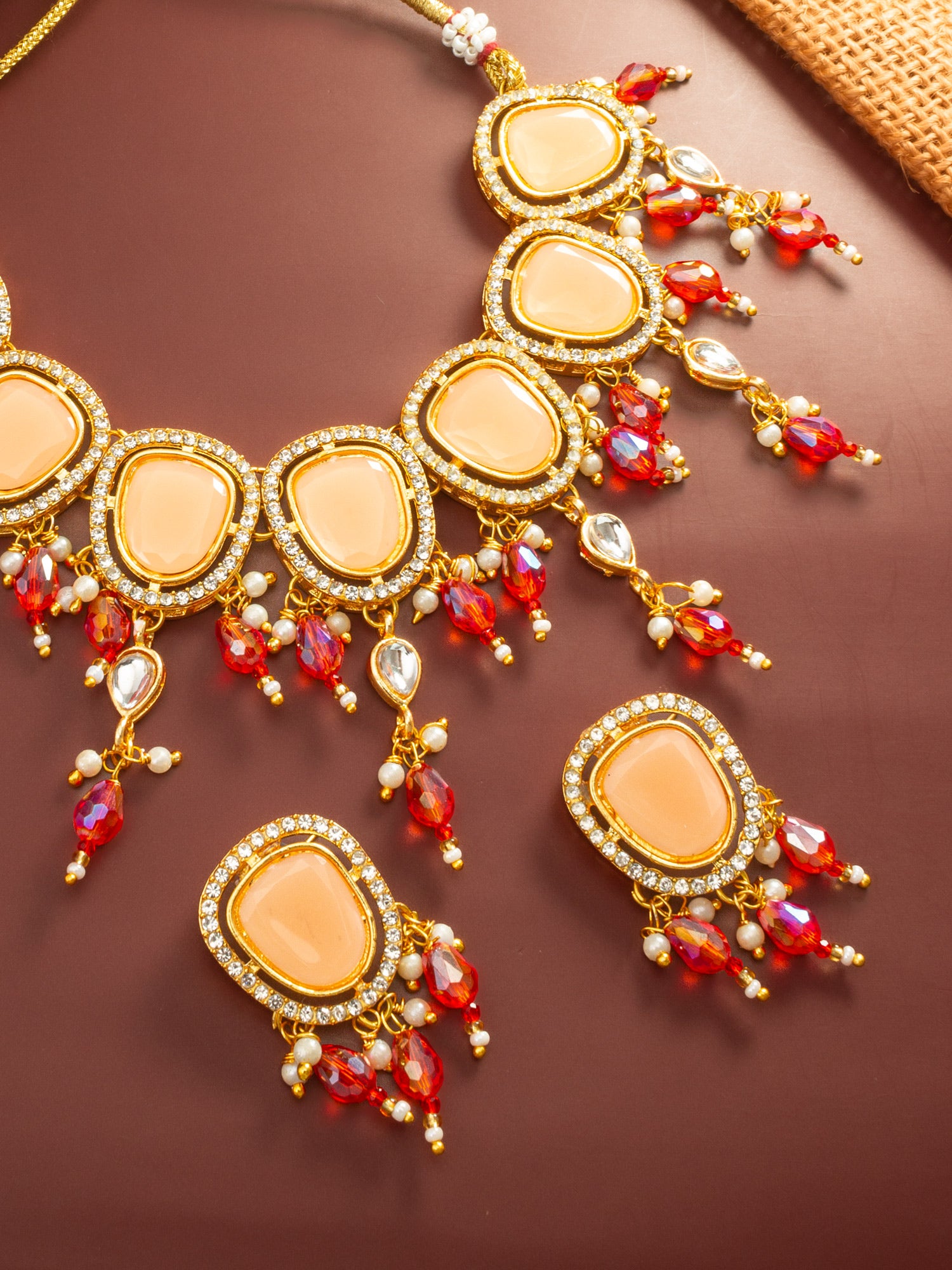 Aadita Gold Plated Peach Stone Choker Necklace with Dangles