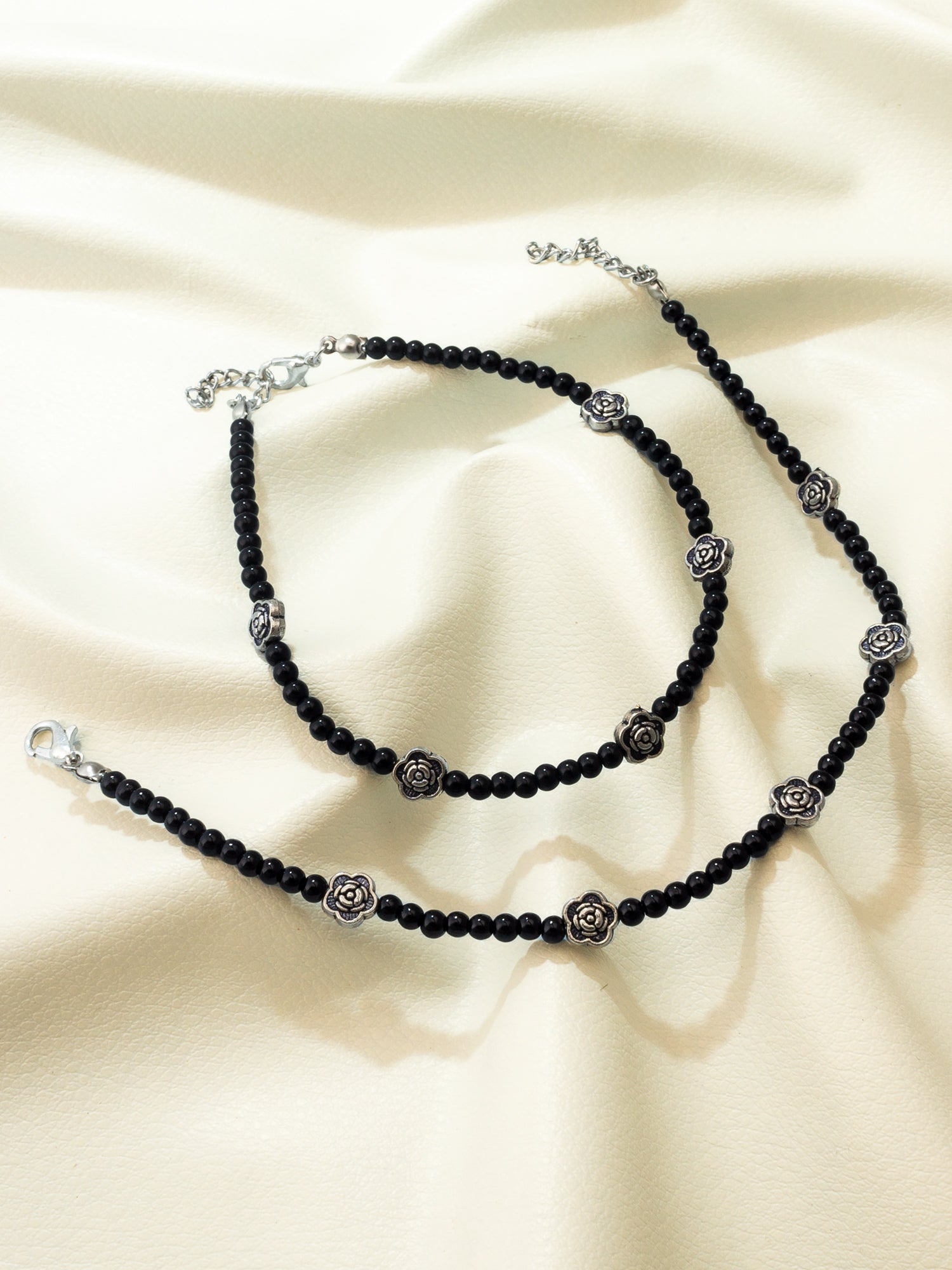 Aadita Oxidized Silver Rose Motif Black Bead Anklets