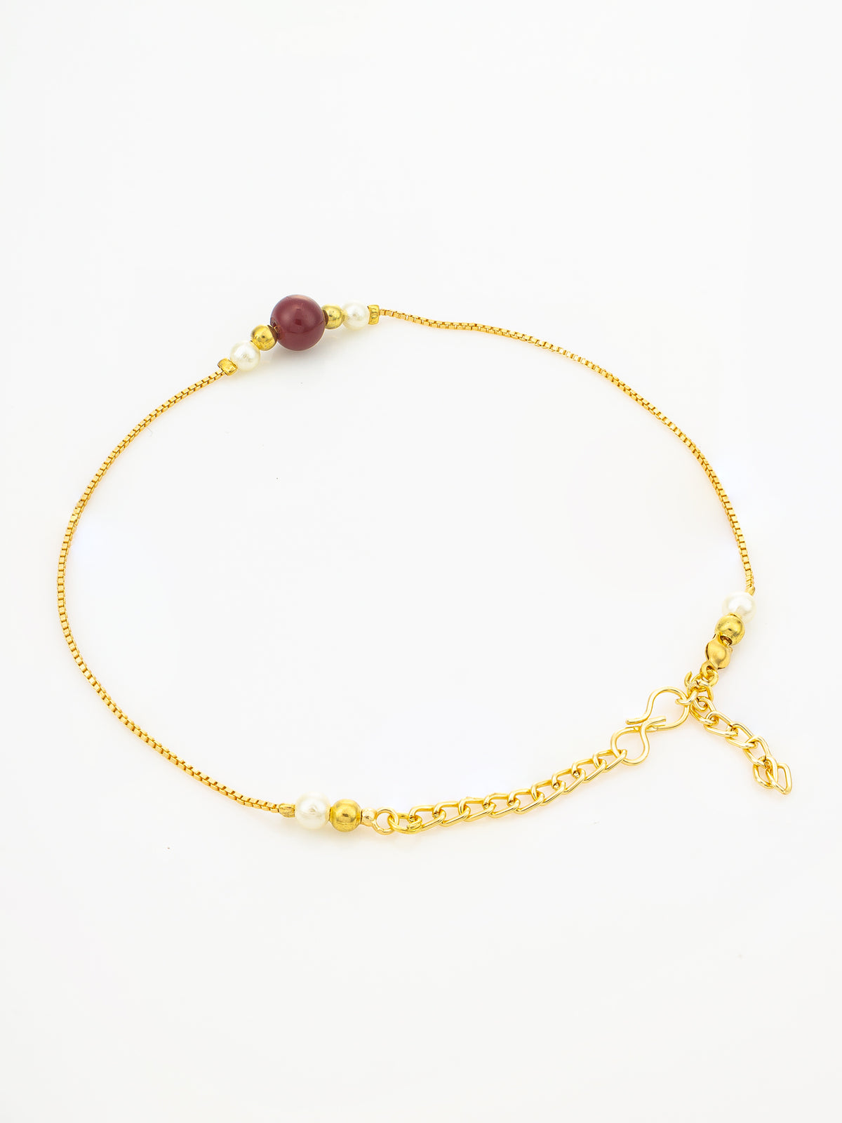 A delicate gold chain anklet featuring a single dark red bead, small white pearl-like beads, and an adjustable lobster clasp, displayed on a clean white background.