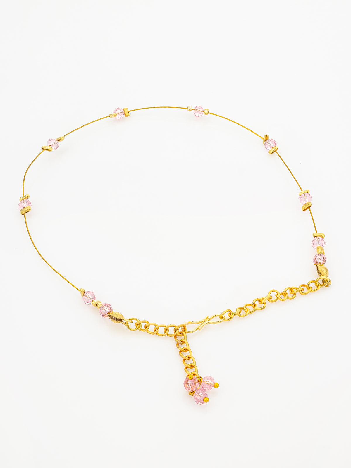 A gold chain necklace with small pink crystal beads spaced along the thin chain and a larger gold chain section at the front featuring a dangling pink crystal flower charm, displayed on a clean white background.