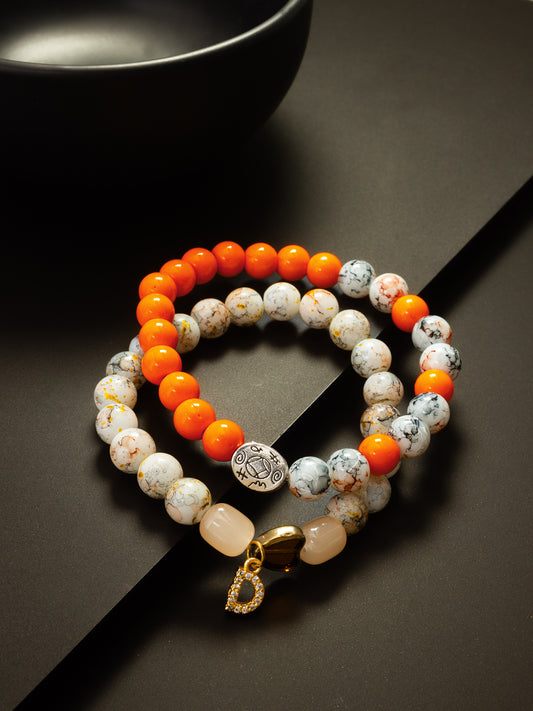 Aadita Casual Wear Orange and White Marble Beaded Stretch Bracelet Set with Charm Accents