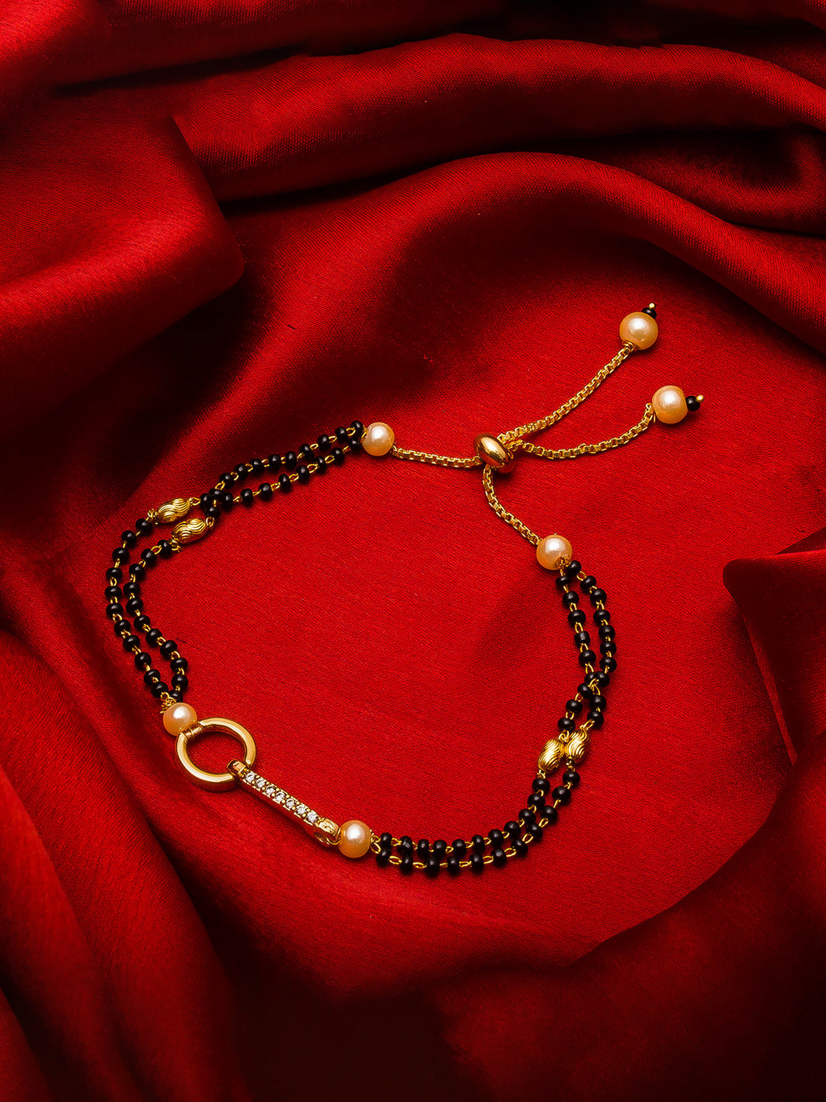 Aadita Gold Plated Circle and Bar Black Bead Mangalsutra Bracelet