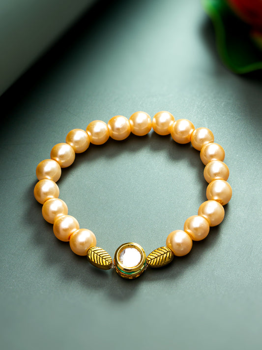 Aadita Pearl Beaded Bracelet with Gold Tone Leaf Motif