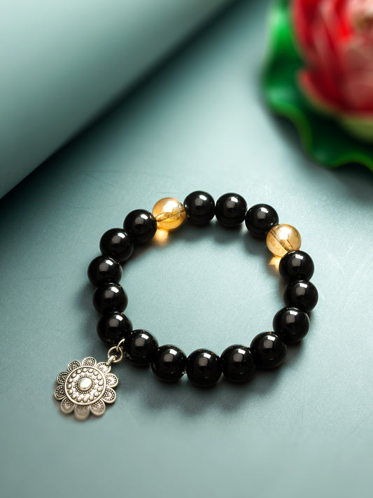 Aadita Black Beaded Bracelet with Silver Floral Charm