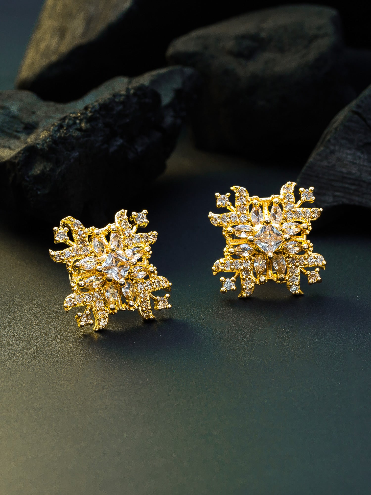 Aadita Festive Wear Gold-Plated Champagne and White AD Stone Floral Snowflake Stud Earrings
