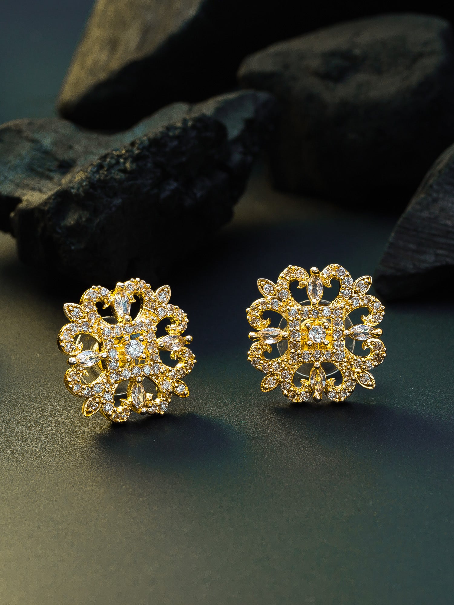 Aadita Traditional Wear Gold-Plated White AD Stone Filigree Floral Stud Earrings
