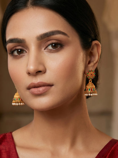 Aadita Antique Gold Floral Jhumka Earrings with Stones and Pearl Drops