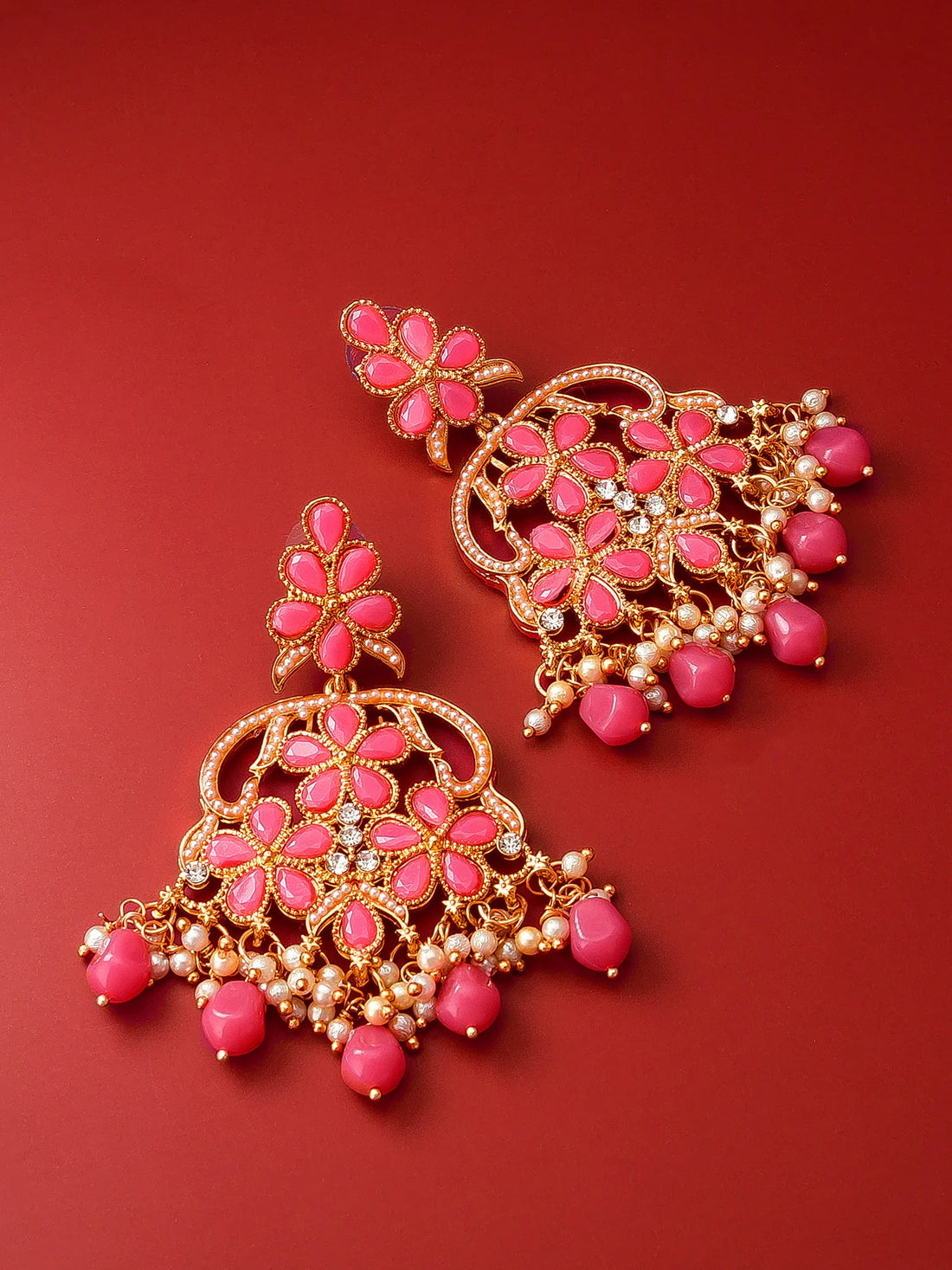 Floral Chandelier Earrings On A Red Background