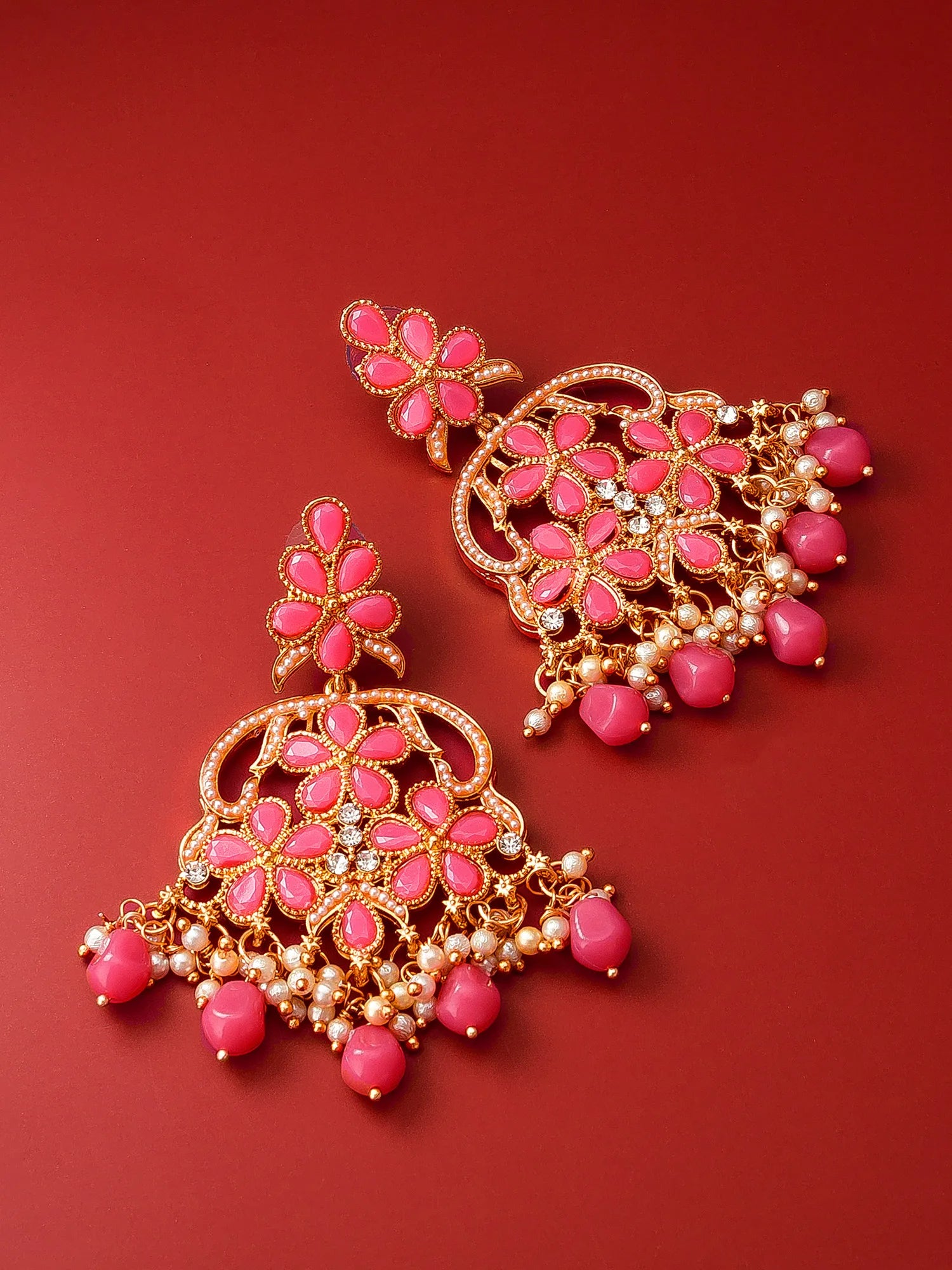 Floral Chandelier Earrings On A Red Background