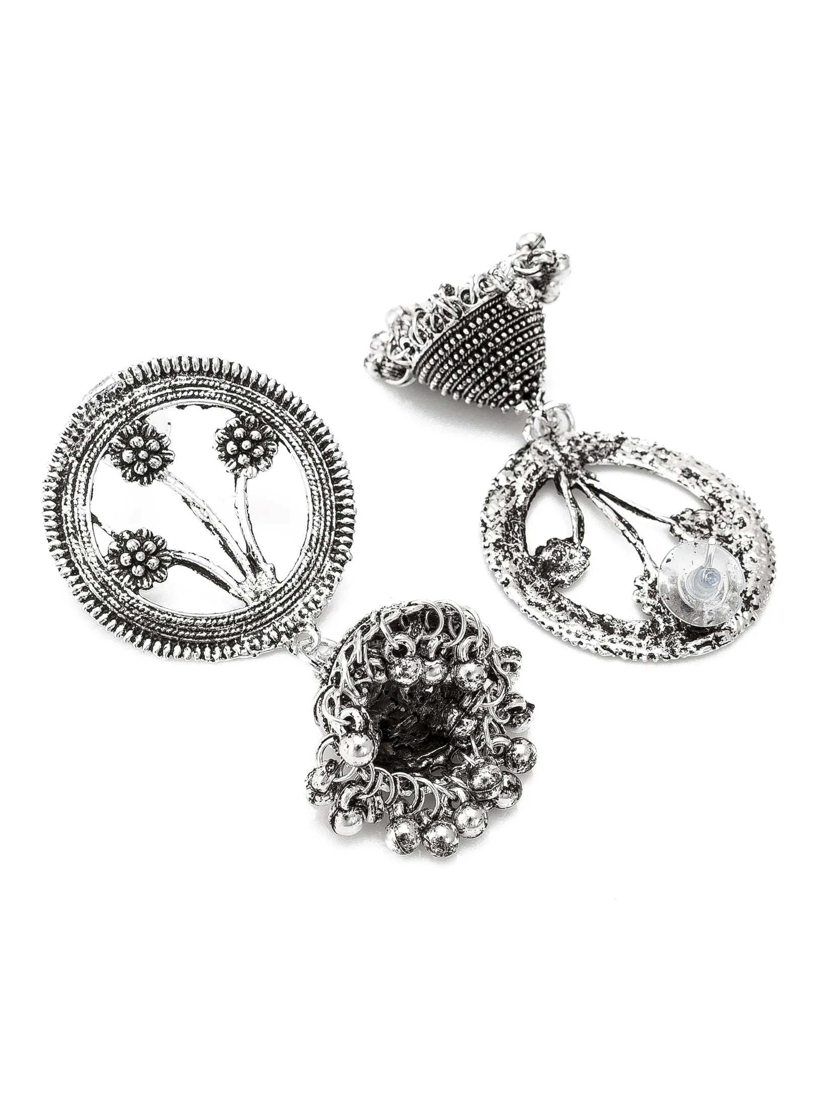 A pair of ornate silver-toned earrings with intricate filigree, floral motifs, and dangling textured details, shown on a plain white background.