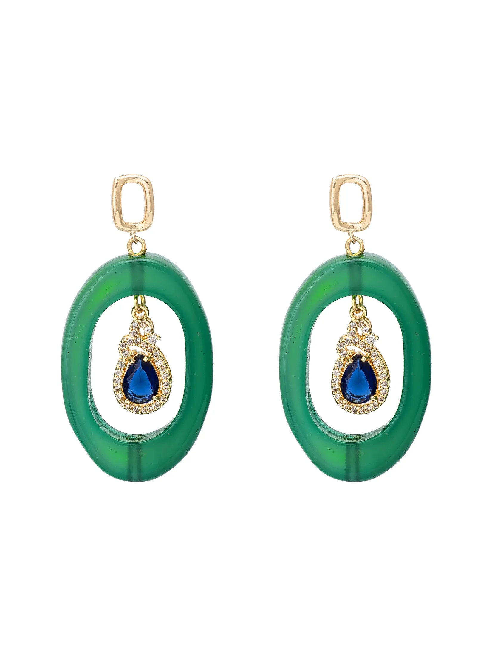A pair of gold-tone drop earrings featuring large, oval-shaped translucent green resin frames with a teardrop-shaped blue gemstone and small clear crystals at the center, shown against a plain white background.