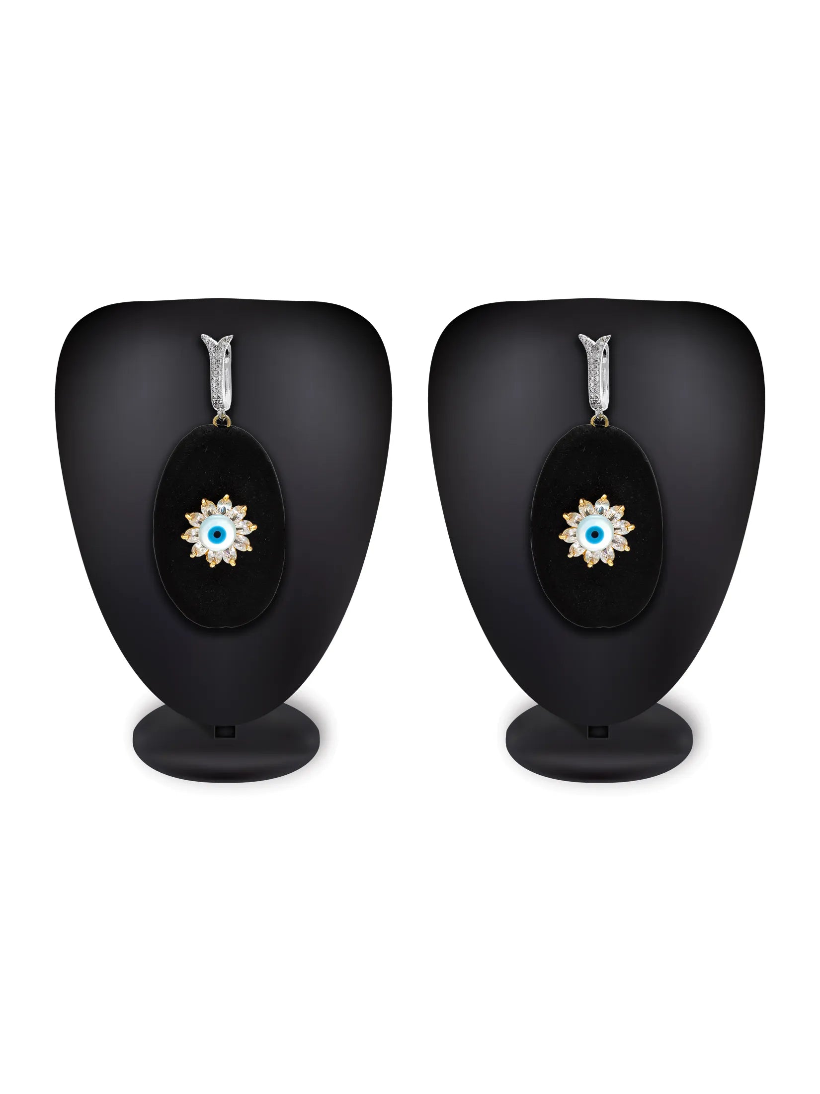 A pair of black oval drop earrings displayed on black mannequin stands against a white background. Each earring has a silver-tone top bar and a central starburst design with a light blue stone surrounded by small clear stones.