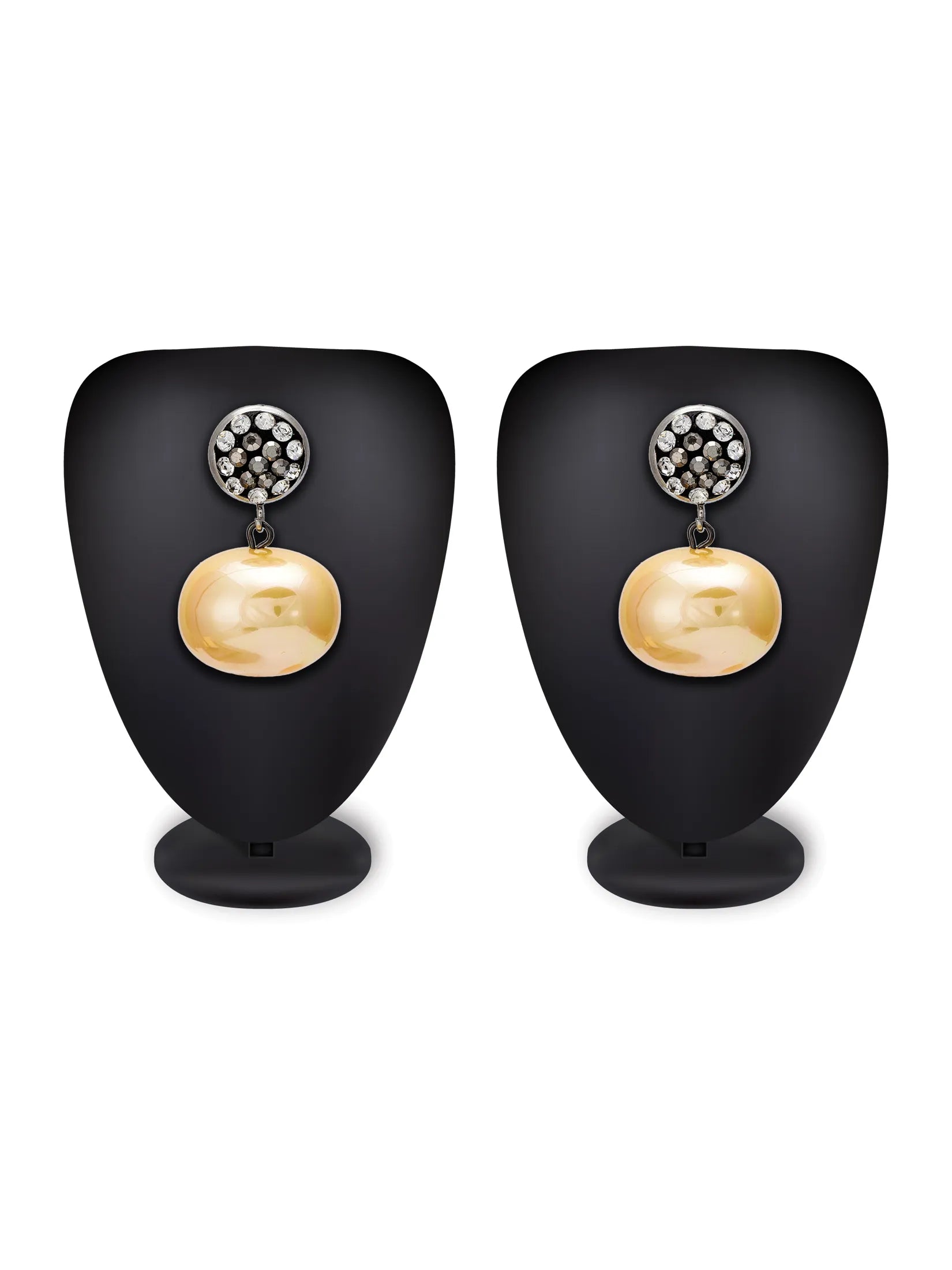 A pair of gold and silver drop earrings displayed on black mannequin busts against a white background. Each earring features a round silver stud set with small clear stones and a large, smooth gold oval drop.