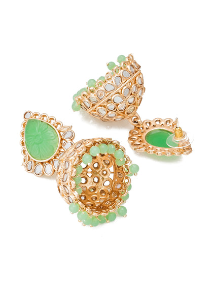 Aadita Traditional Wear Gold-Plated Mint Green Kundan and Carved Stone Jhumka Earrings with Bead Drops