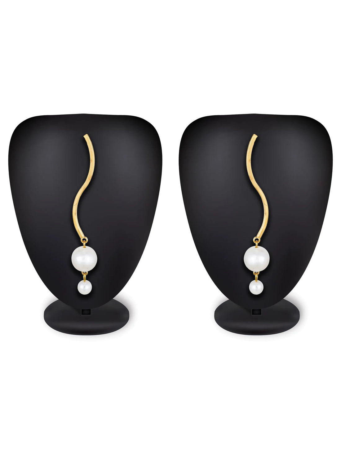 Gold-tone wavy hoop earrings with dangling white pearl drops, displayed on a soft white satin fabric background.