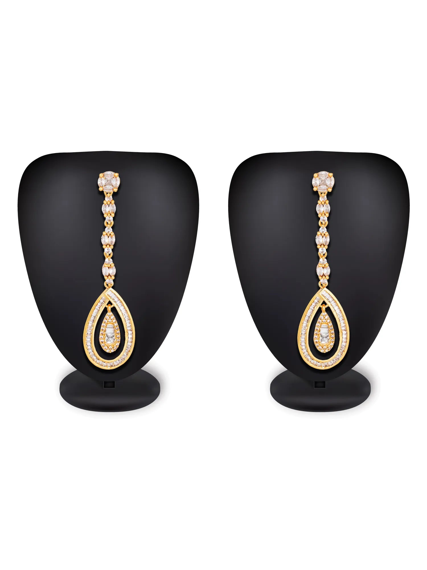 A pair of gold teardrop dangle earrings with clear pavé-set stones, displayed on black jewelry busts against a white background.