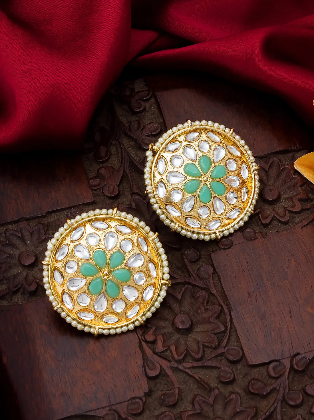 Meenakari Stud Earrings On A Background