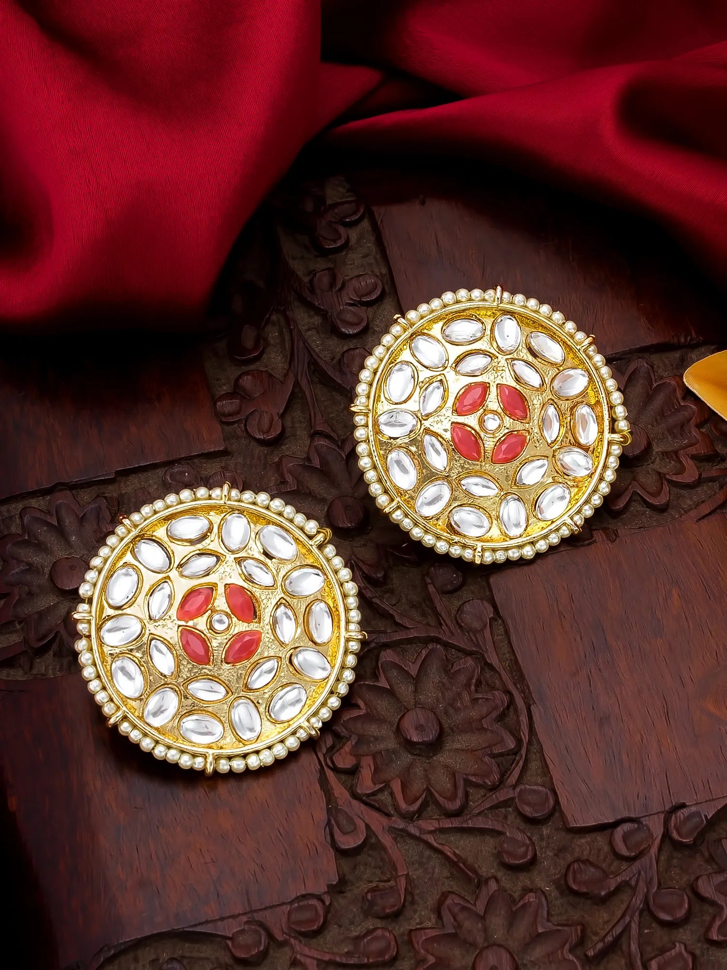Floral Coral Stud Earrings On A Background