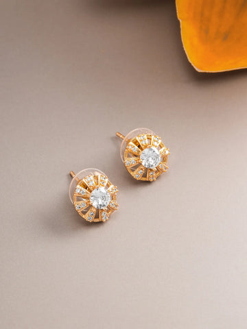 Wheel Design Solitaire Stud Earrings On A Background
