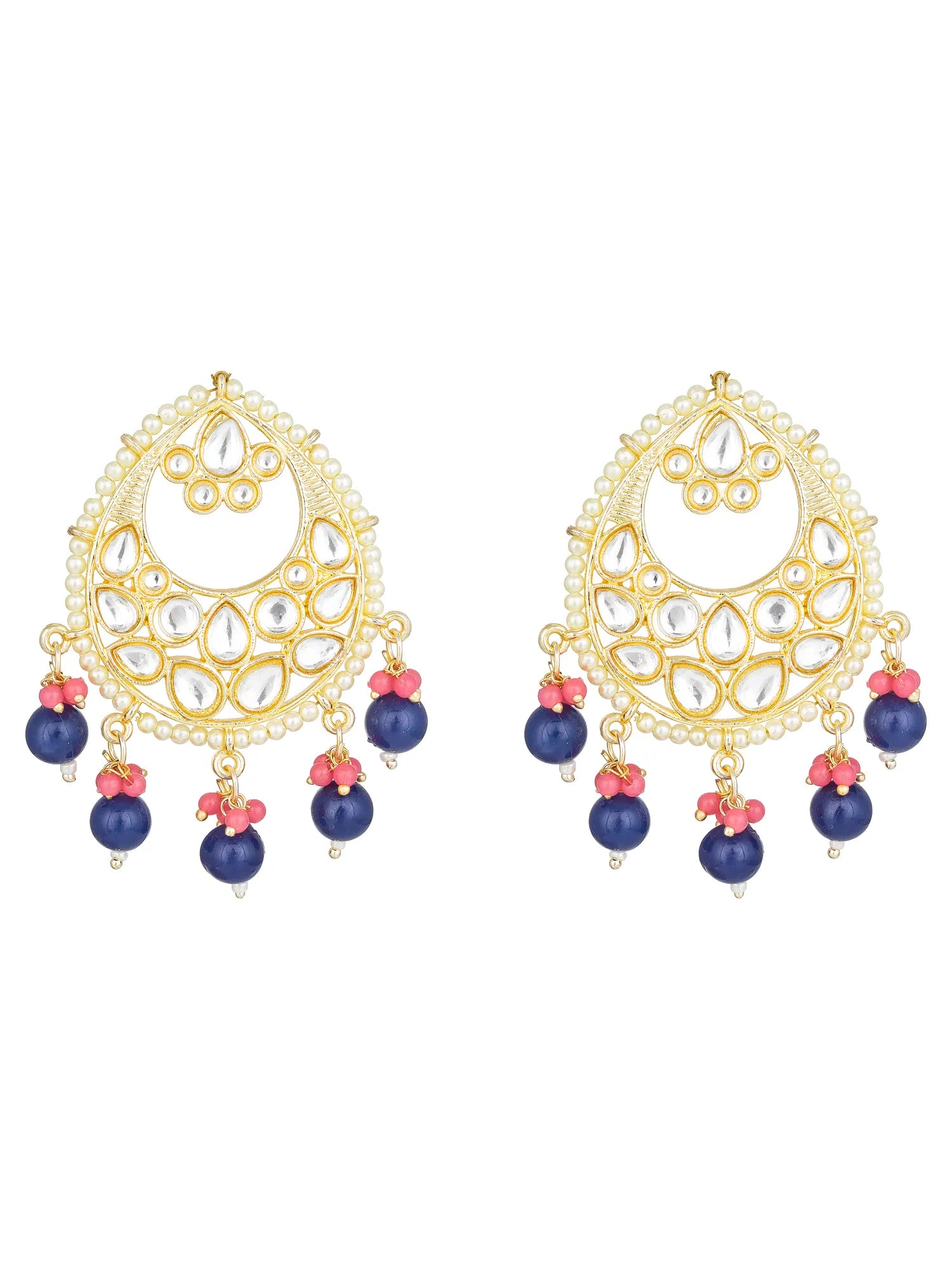 A pair of gold-plated Indian chandelier earrings decorated with white faux pearls, clear crystals, and dangling navy blue beads accented with pink flower charms, shown on a plain white background.