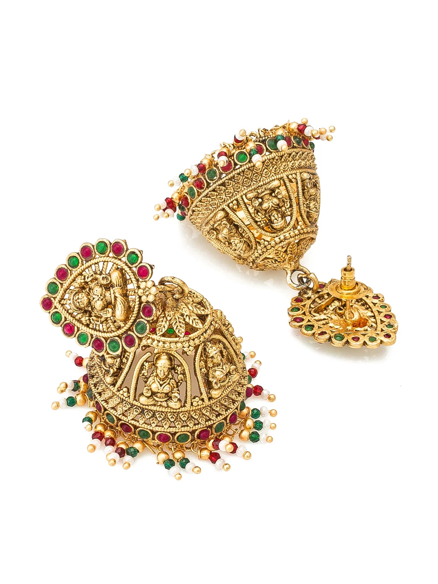 A pair of ornate gold-toned traditional Indian jhumka earrings embellished with red and green stones and small gold bead drops, displayed on a clean white background.