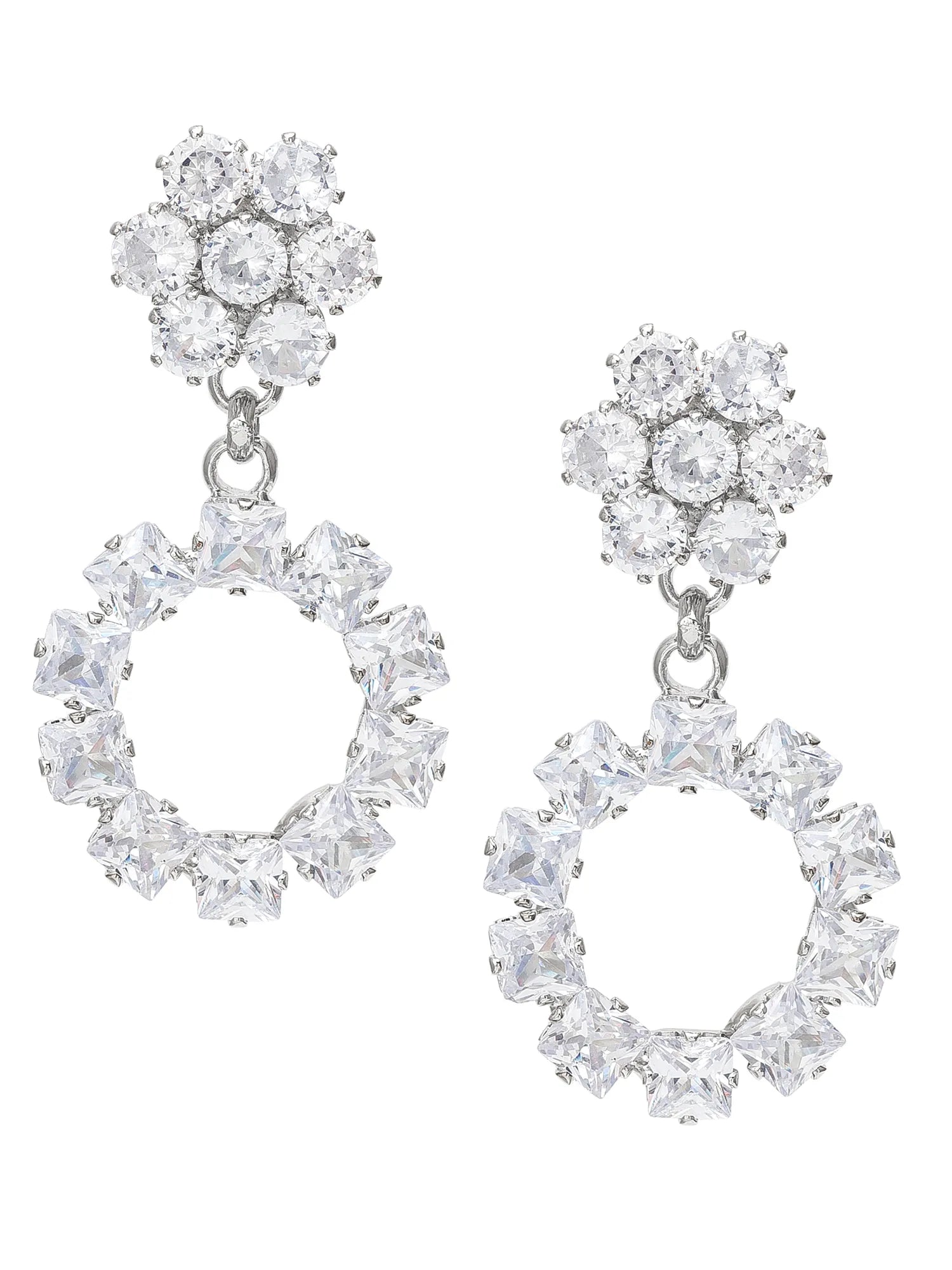 Pair of silver earrings with clear gemstones on a white background