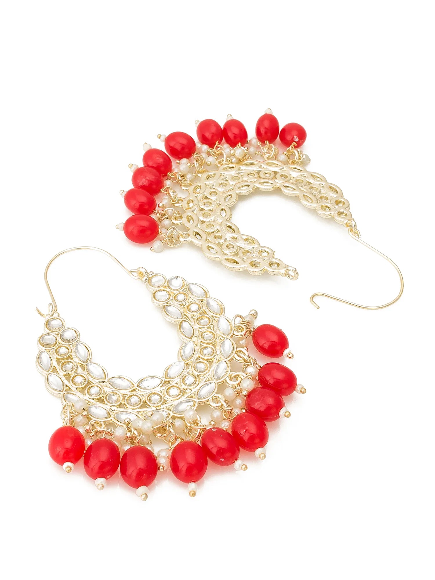 Pair of gold hoop earrings with red beads on a white background
