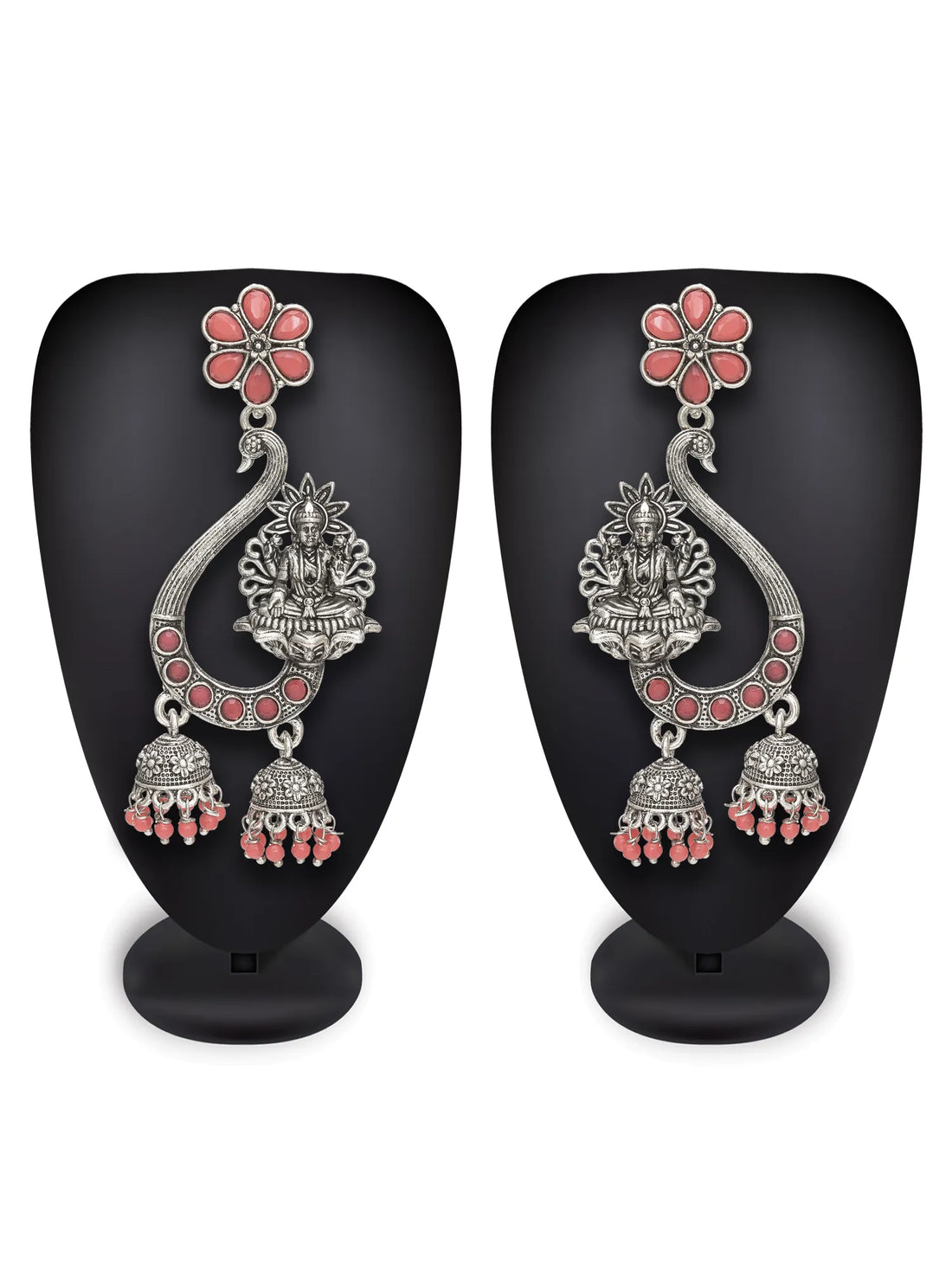 Oxidized Lakshmi Chandbali Earrings On A Green Background