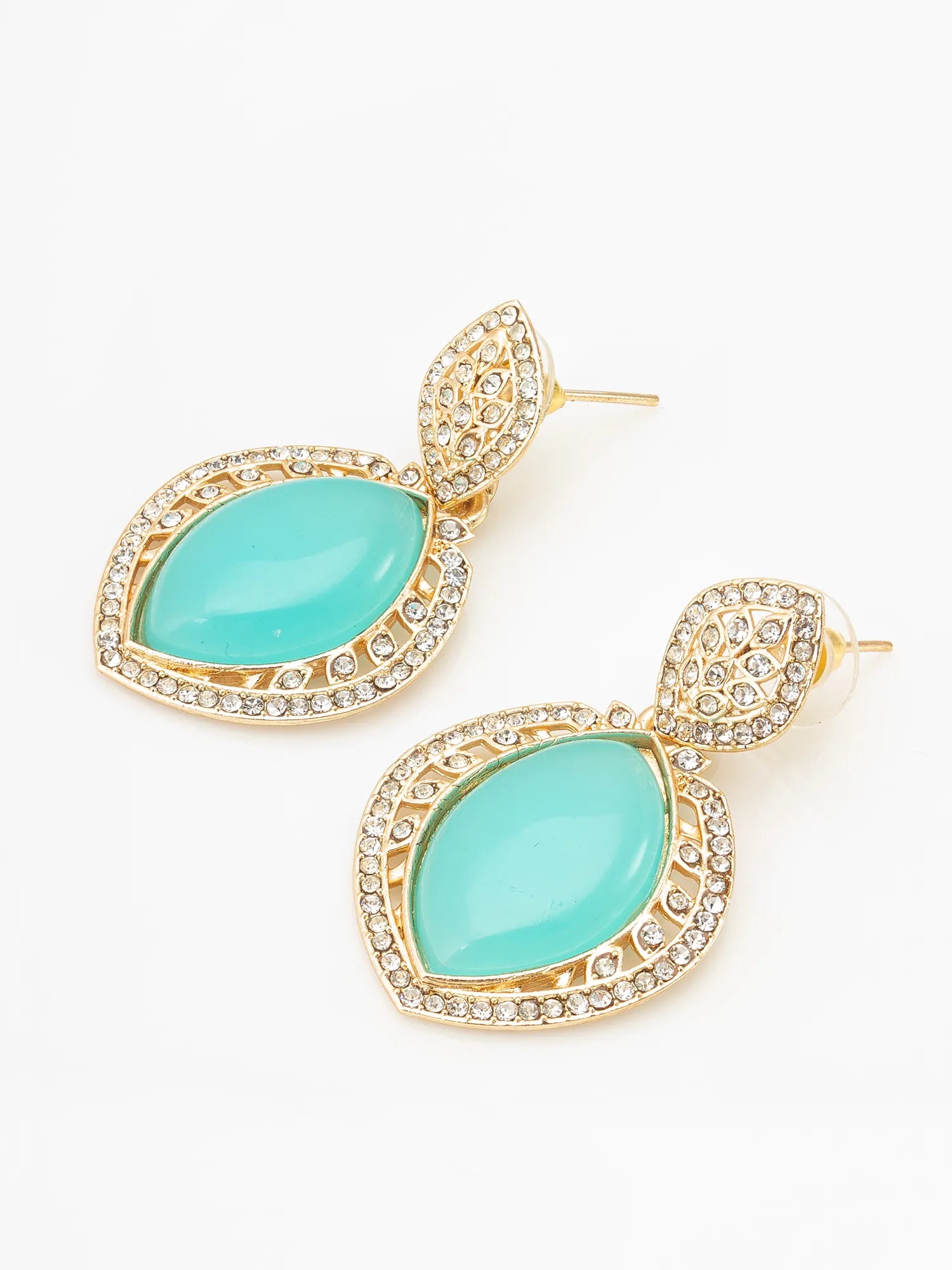 Turquoise earrings with gold accents on a white background
