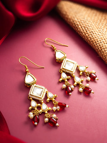 Gold Toned Kundan Chandelier Earrings with Red Bead Drops