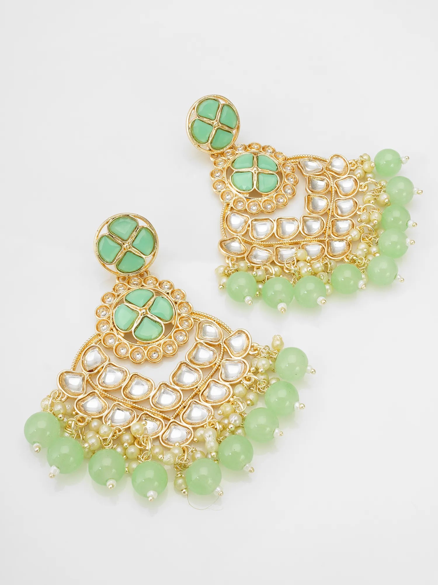 Kundan Chandbali Earrings On A White Background