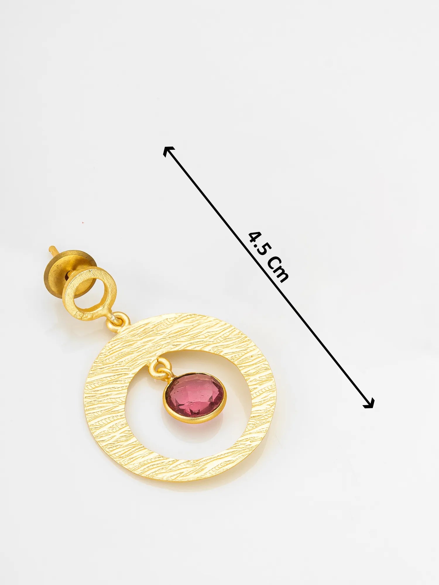 Gold pendant with a pink gemstone and measurement label on a white background