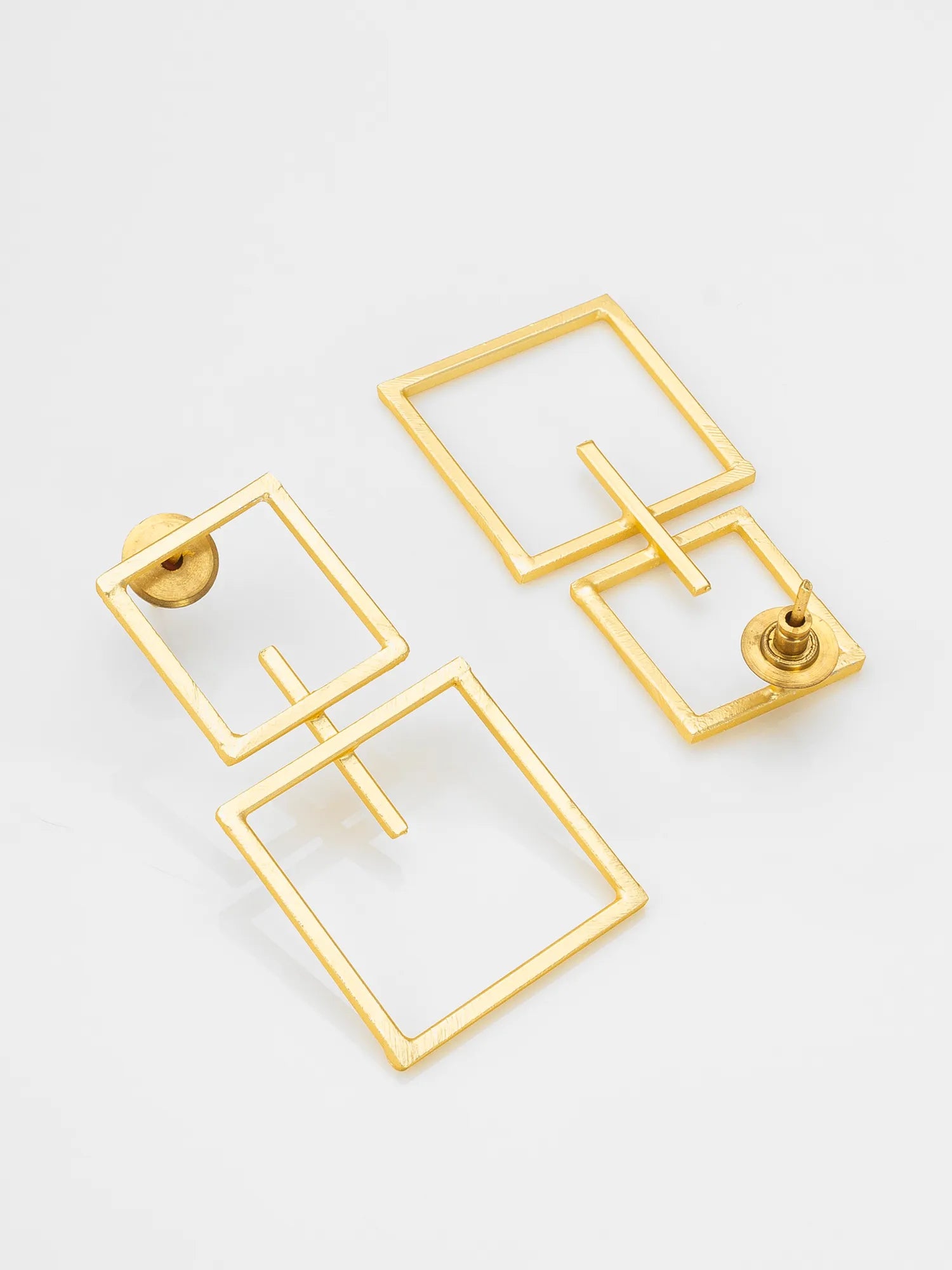 Gold geometric square drop earrings with a thin open-frame design, shown on a clean white background with one earring displaying the post and the other showing the front.