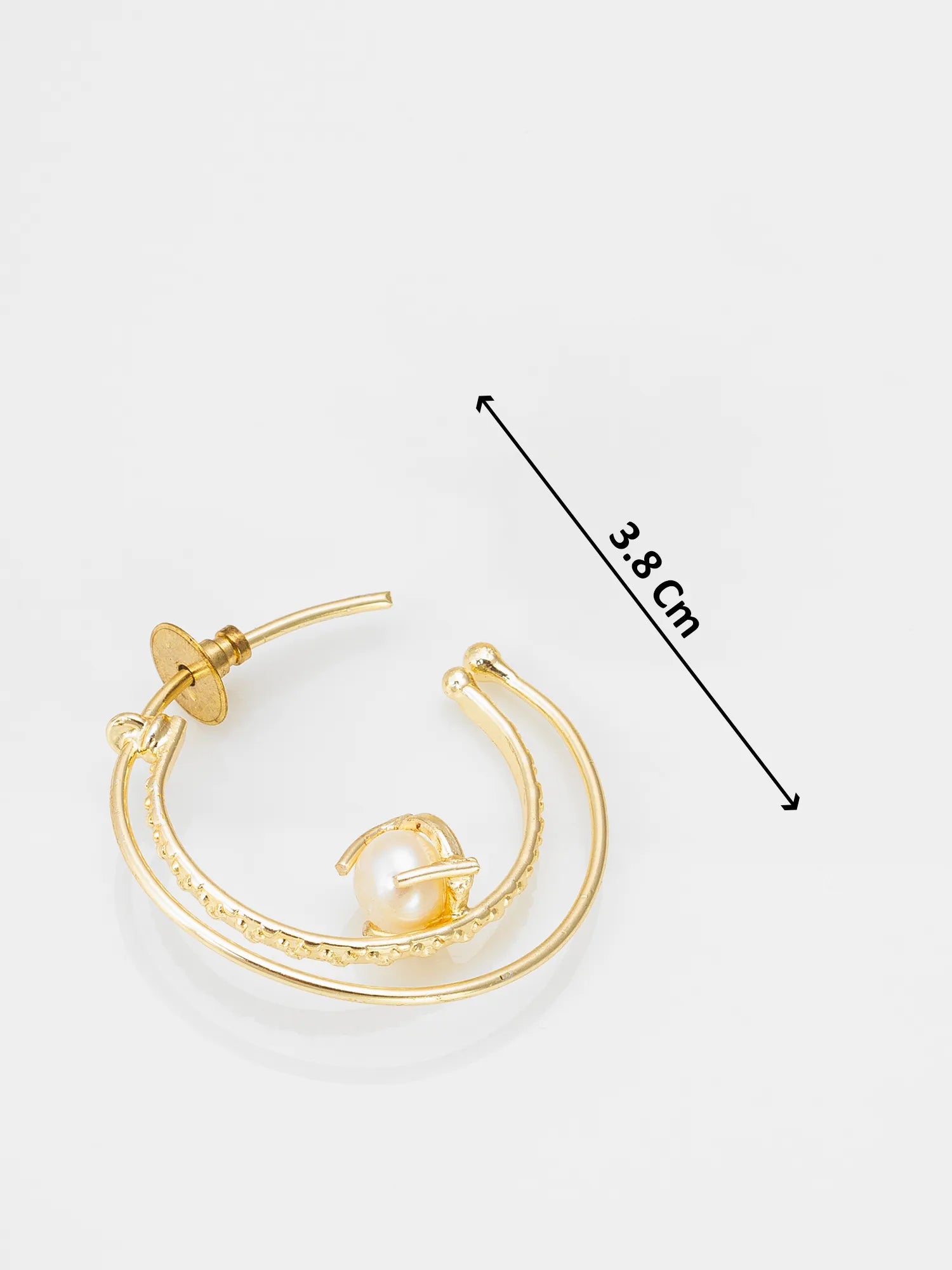 Gold huggie hoop earring with a small pearl accent, shown on a light gray background with a black dimension arrow indicating 3.8 cm.