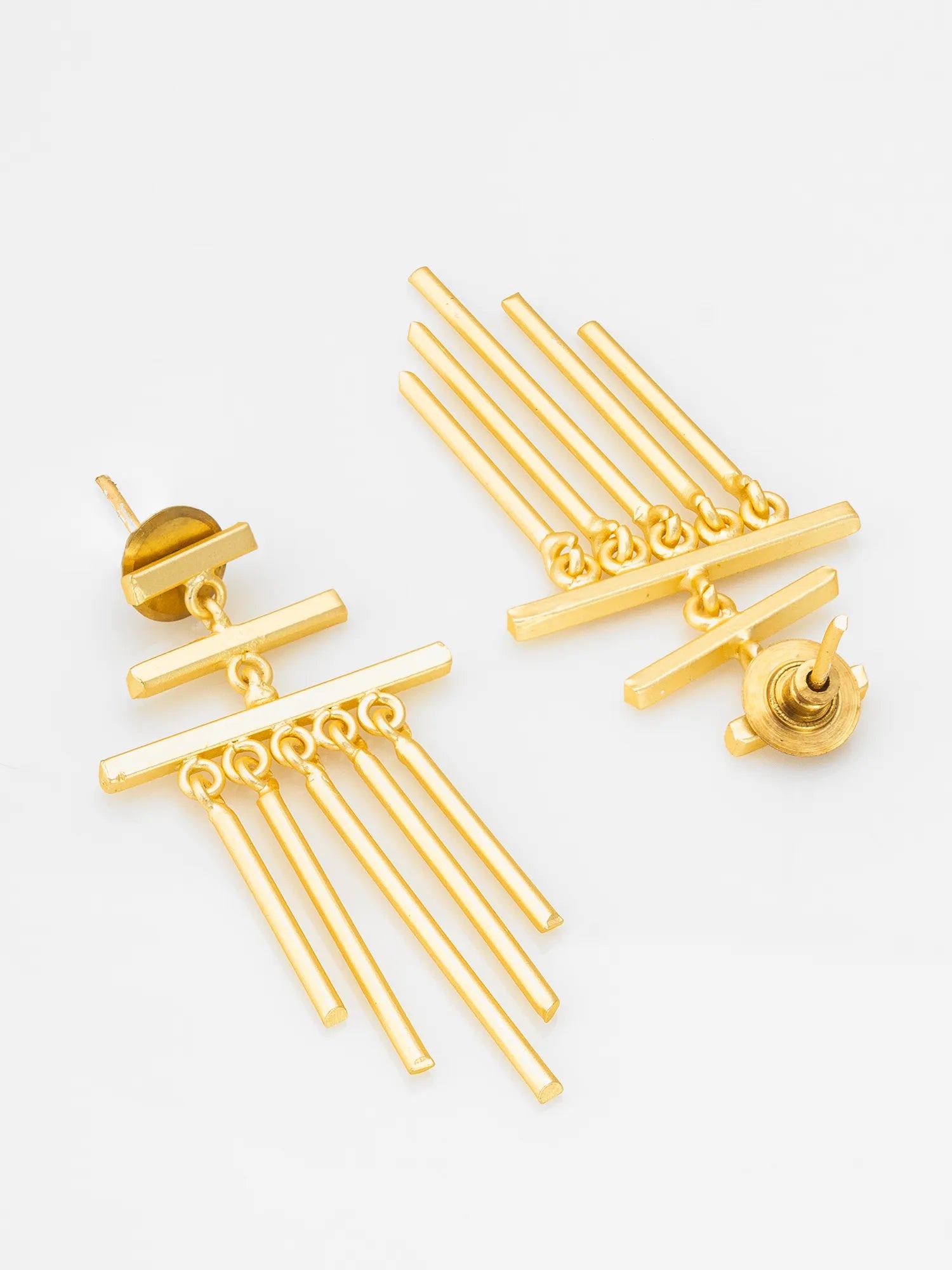 Gold-tone geometric dangle earrings with horizontal bars and multiple vertical rod drops, shown on a clean white background.