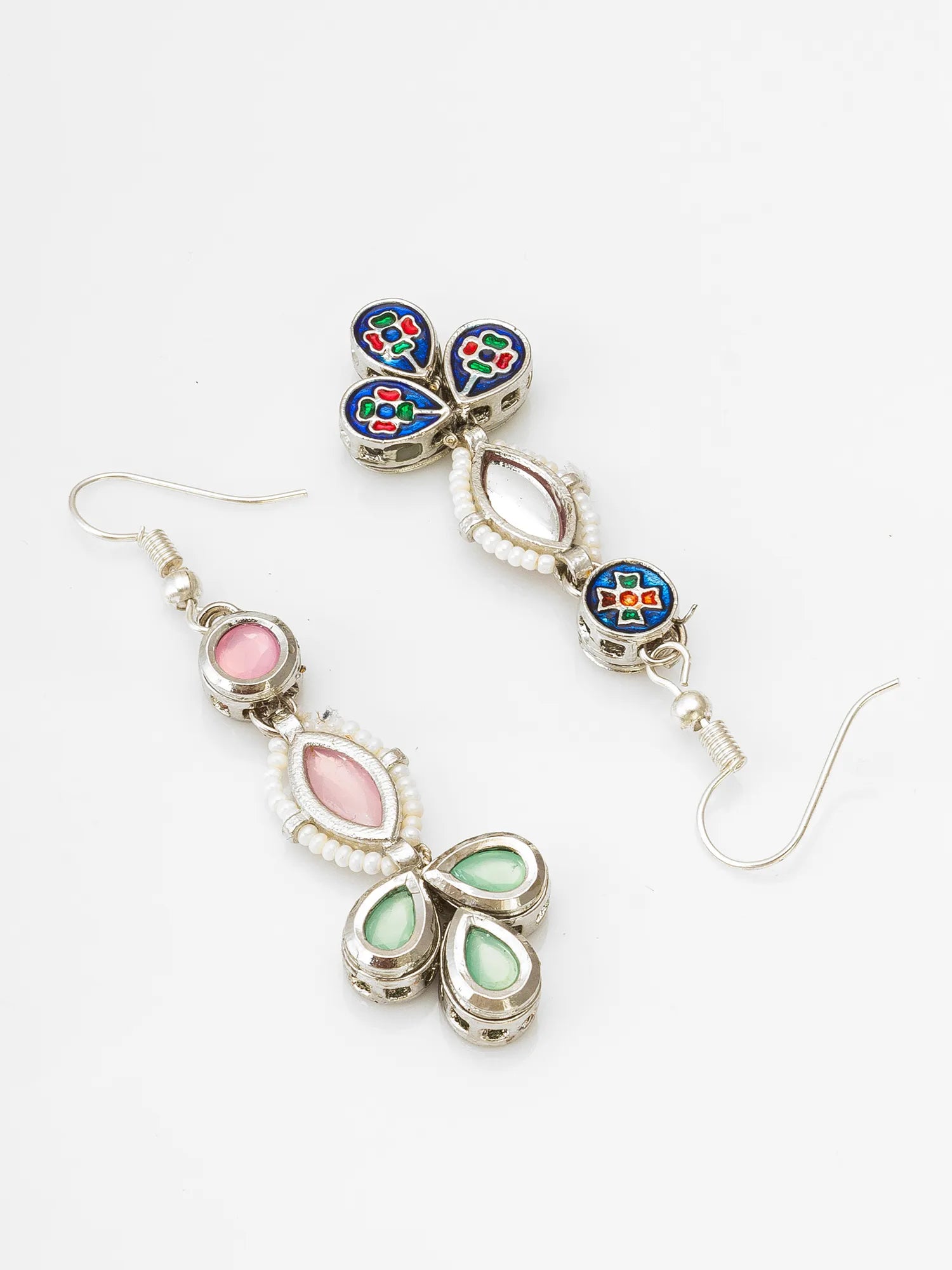 A pair of silver-toned dangle earrings with colorful enamel details, featuring a butterfly motif with pink and green accents on a white background.