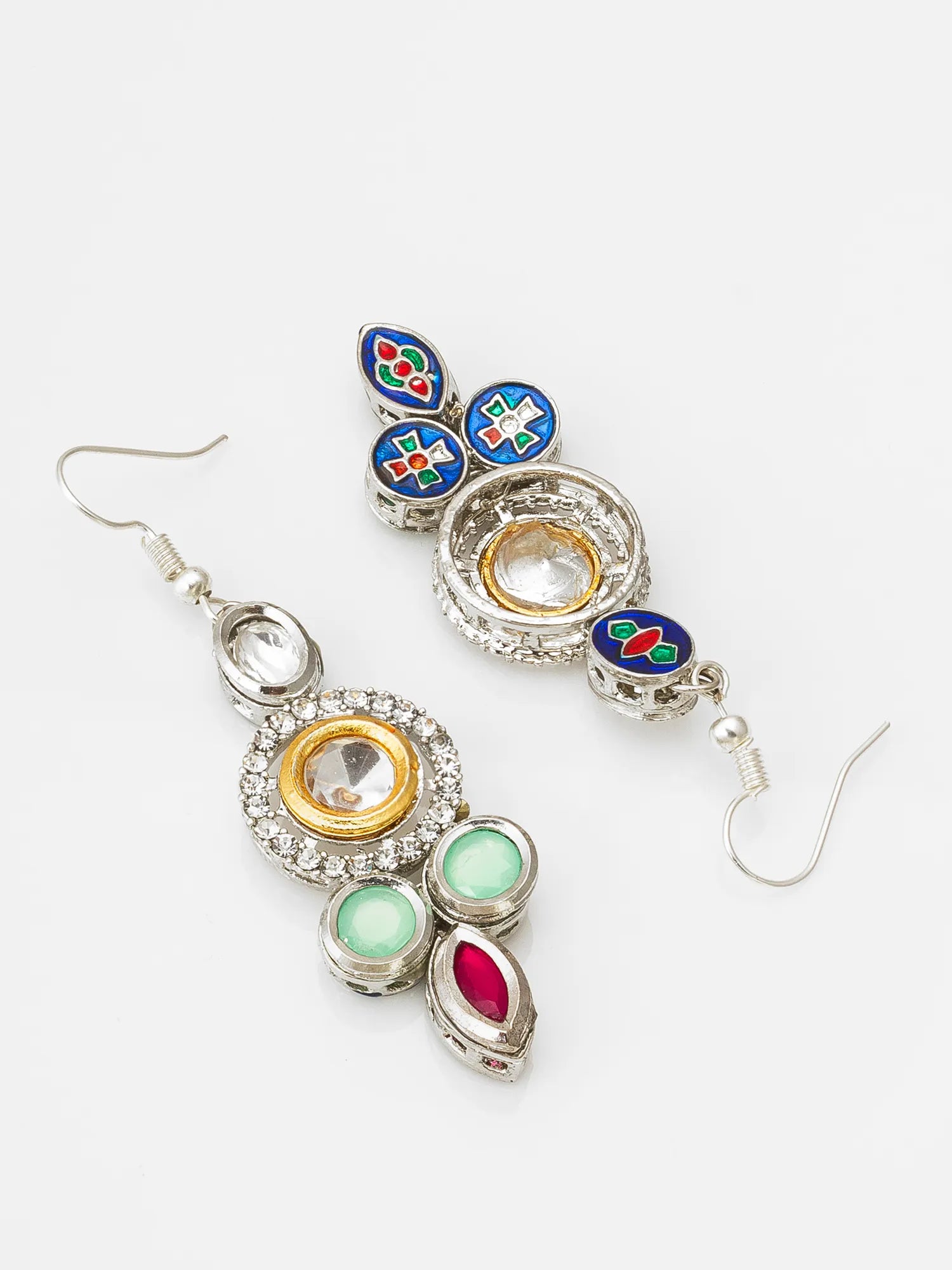 A pair of silver-toned dangle earrings with colorful enamel details, clear rhinestone accents, and green, red, and blue stones, displayed on a light gray background.