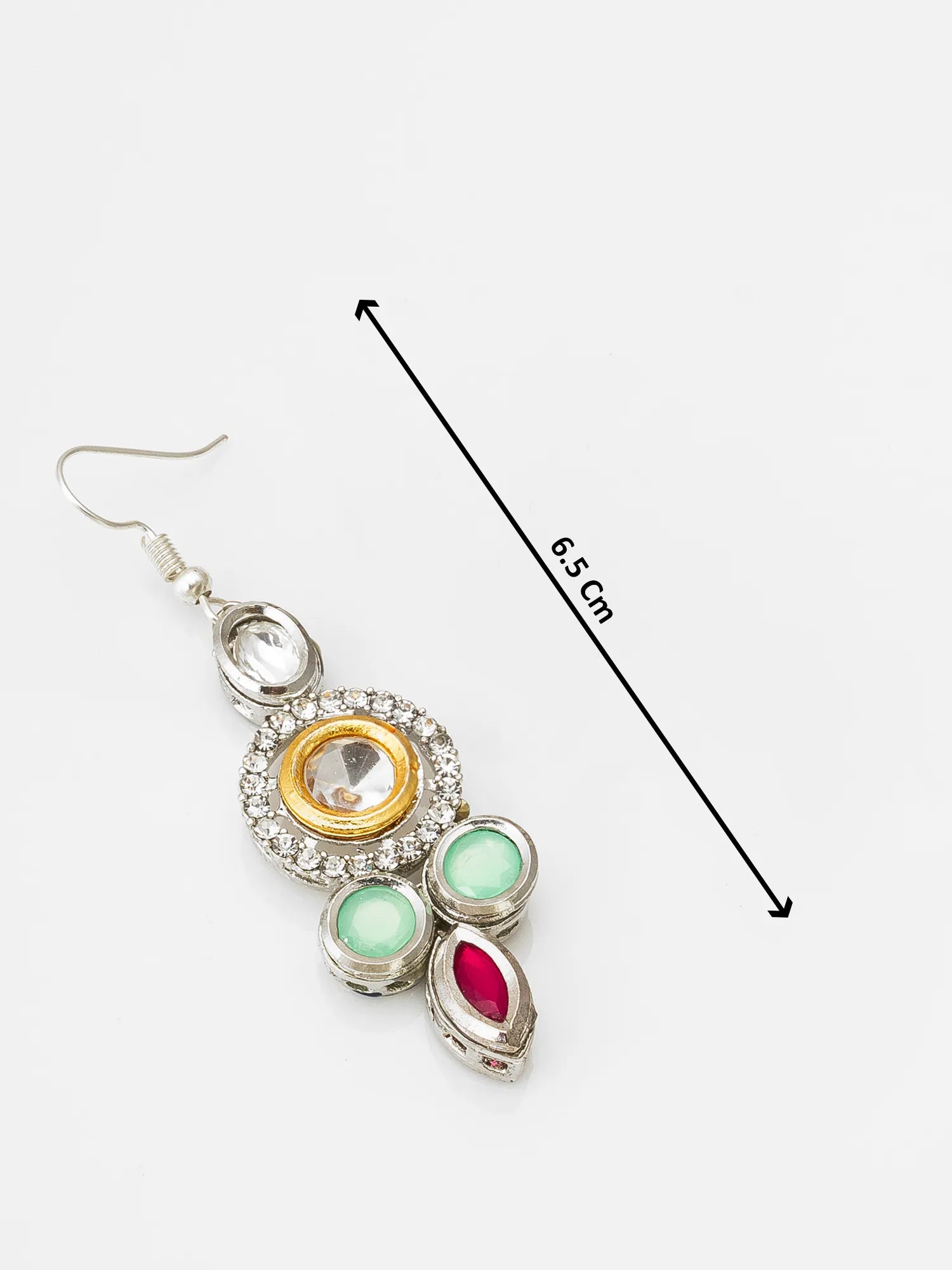 A silver-toned statement dangle earring with a gold circular bezel, clear central stone, and green and pink stones, shown on a white background with a 6.5 cm size indicator.