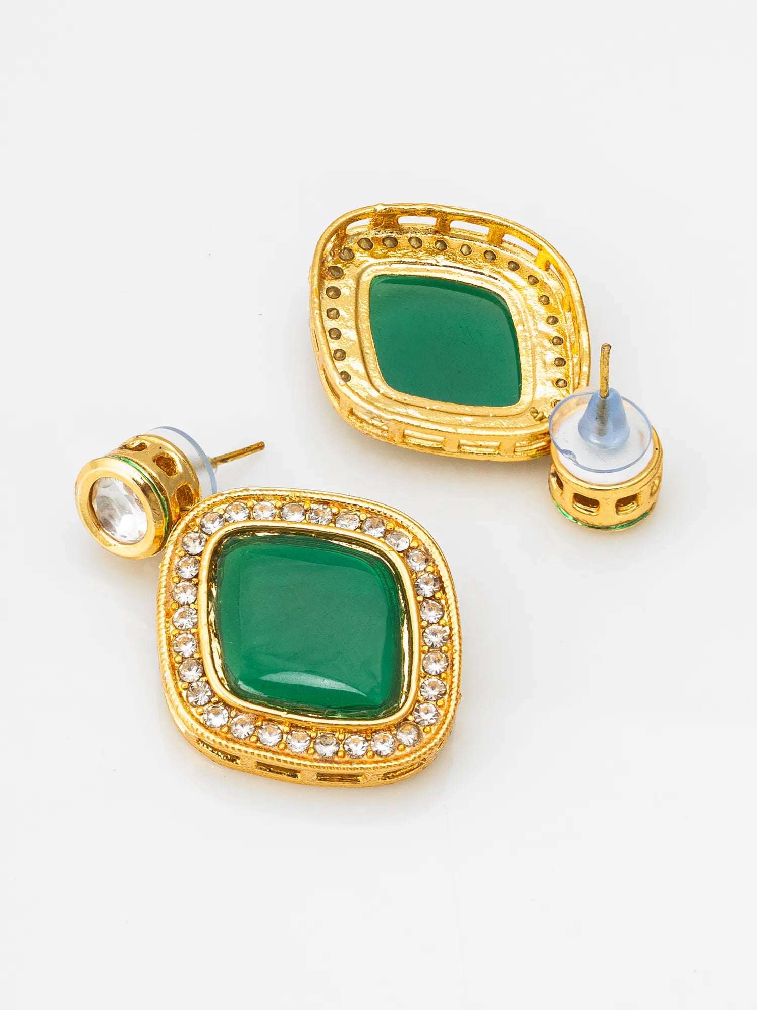 A pair of gold square stud earrings with green square center stones and a border of small clear rhinestones, shown on a white background with one earring facing forward and the other showing the post and backing.