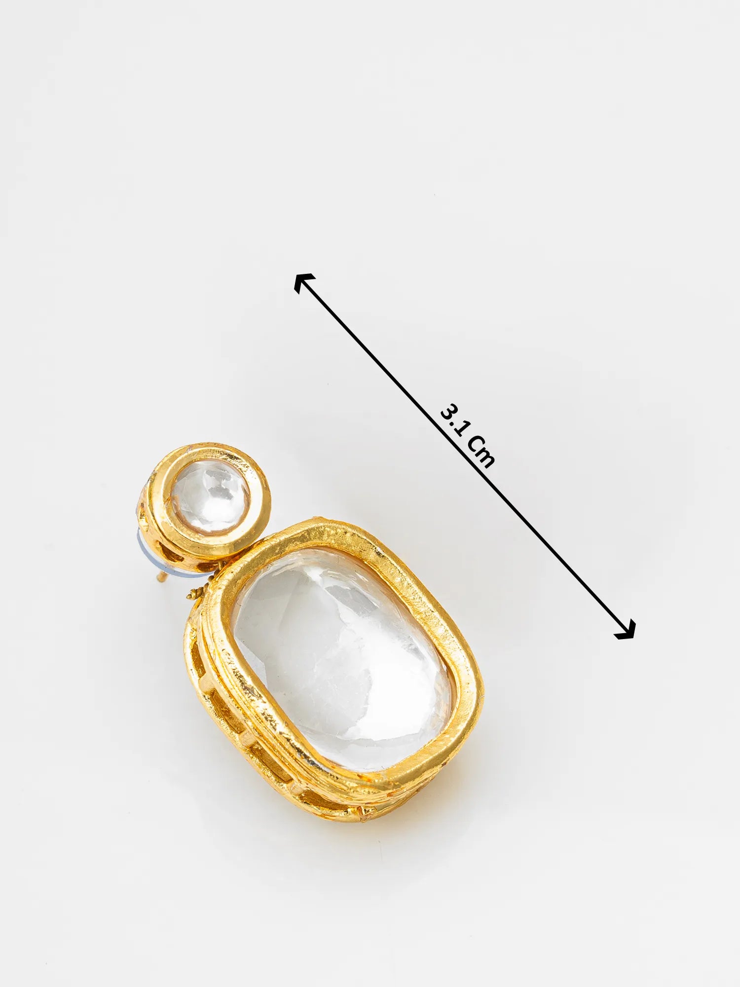 Gold pendant with clear stone and measurement label on a white background