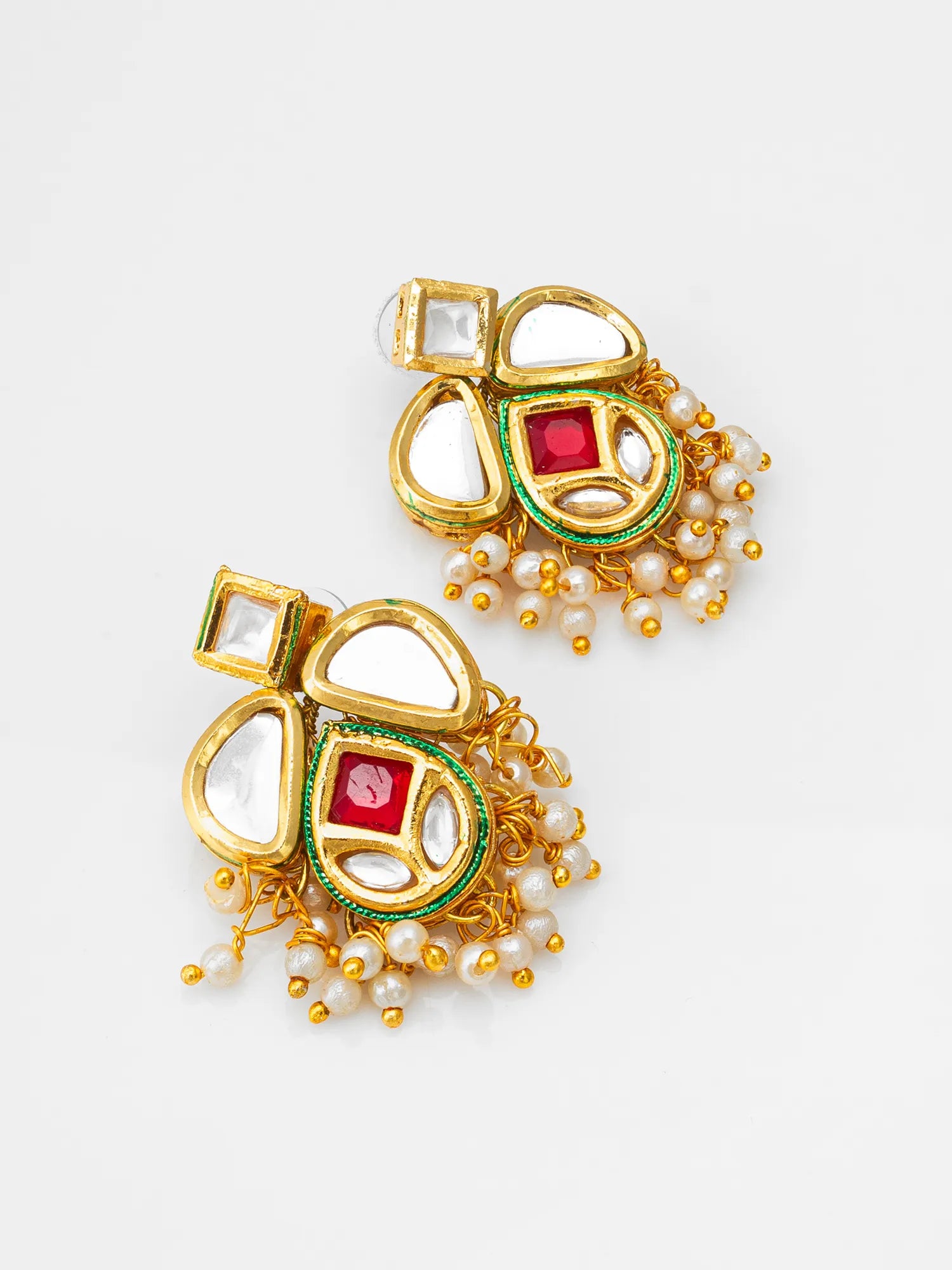 Kundan, Pearl  Stud Earrings On A White Background