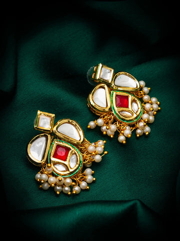 Kundan, Pearl  Stud Earrings  On A Green Background