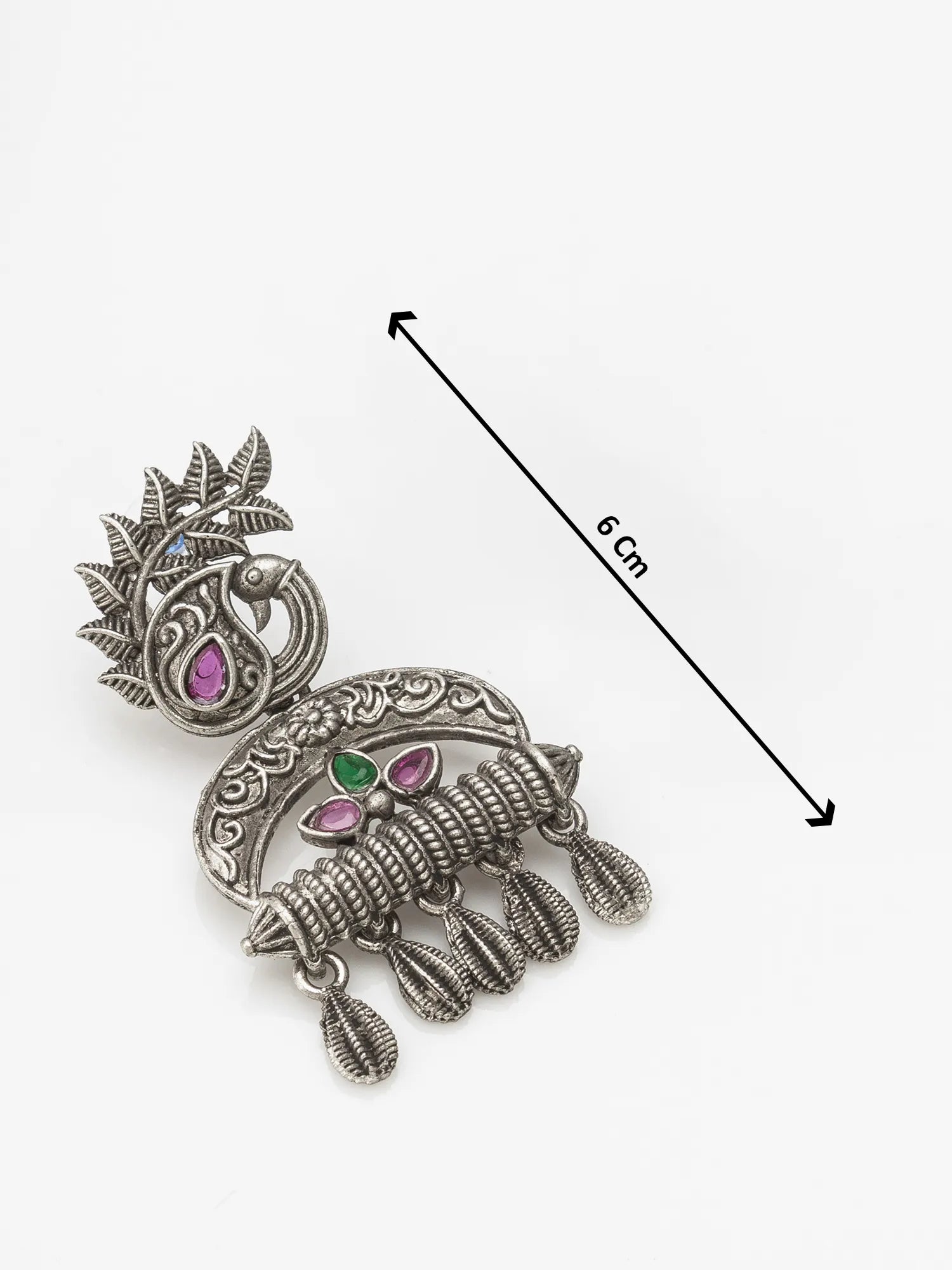 Decorative silver brooch with gemstones and measurements on a white background
