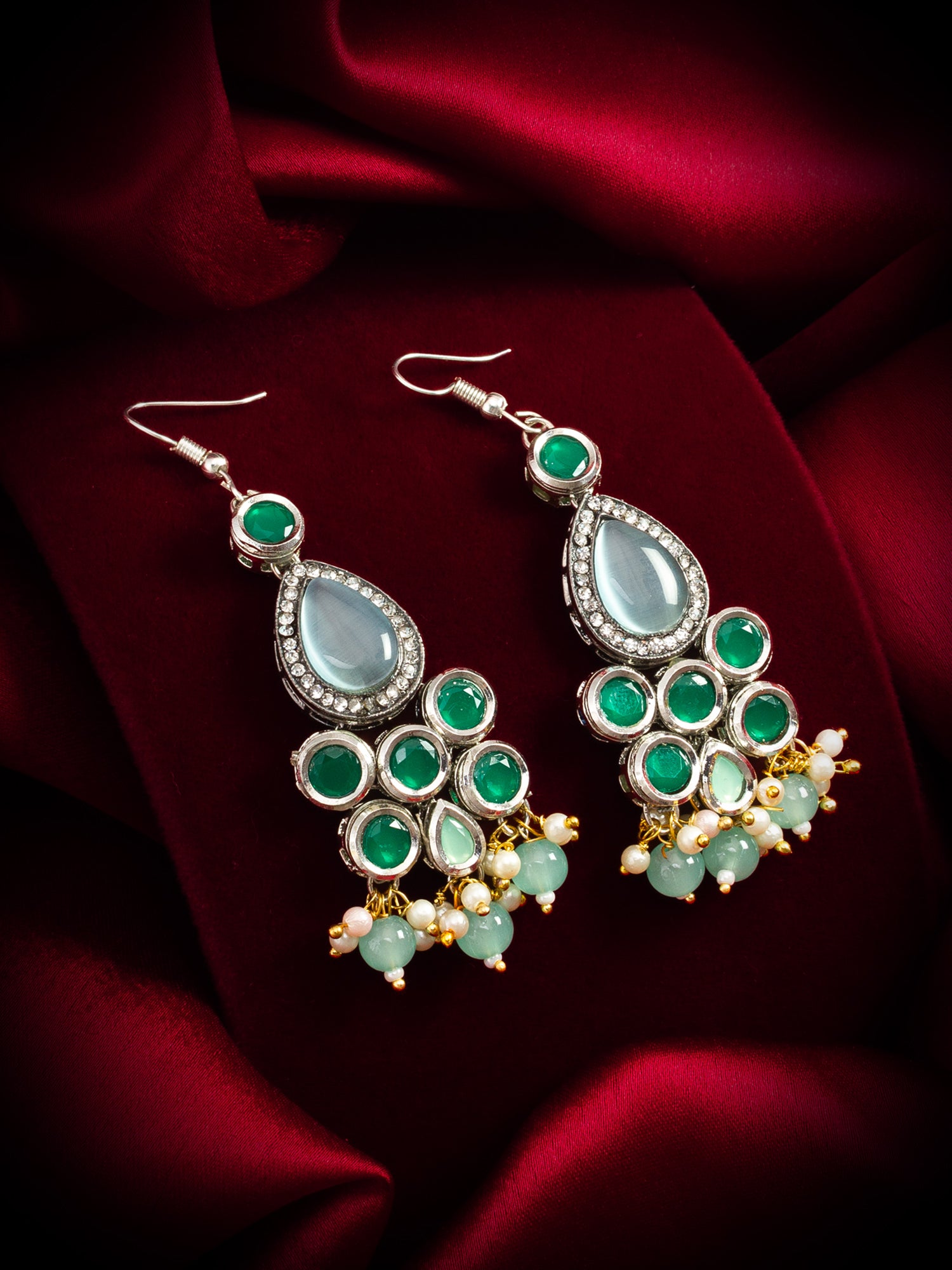 Aadita Party Wear Silver-Toned Green Stone Drop Earrings with Mint Bead and Pearl Tassel Drops
