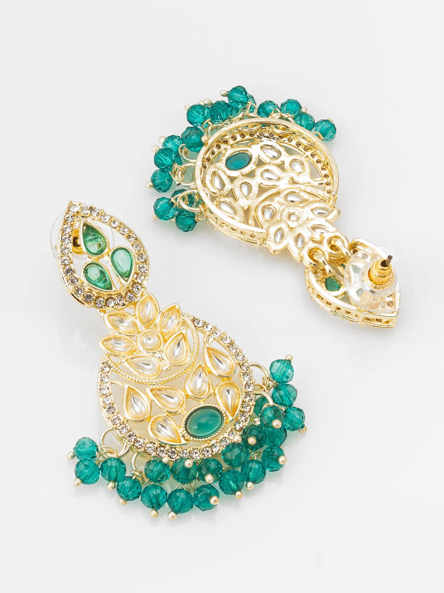 Pair of gold and green beaded earrings on a white background