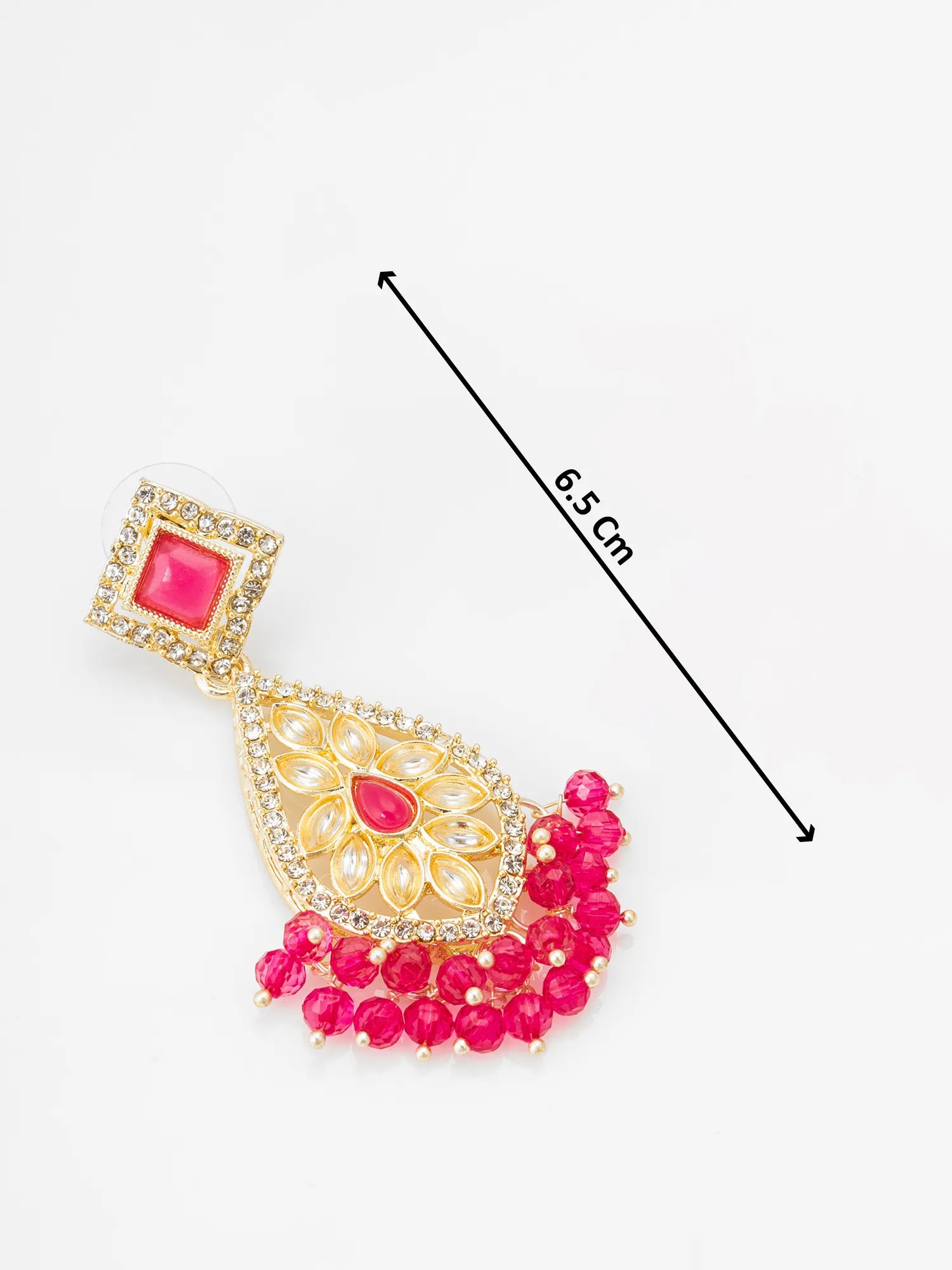 Gold-toned statement earring with a bright pink stone in the top square, a central teardrop motif with clear stones, and a dangling fan of pink beads, shown on a white background with a 6.5 cm size indicator.