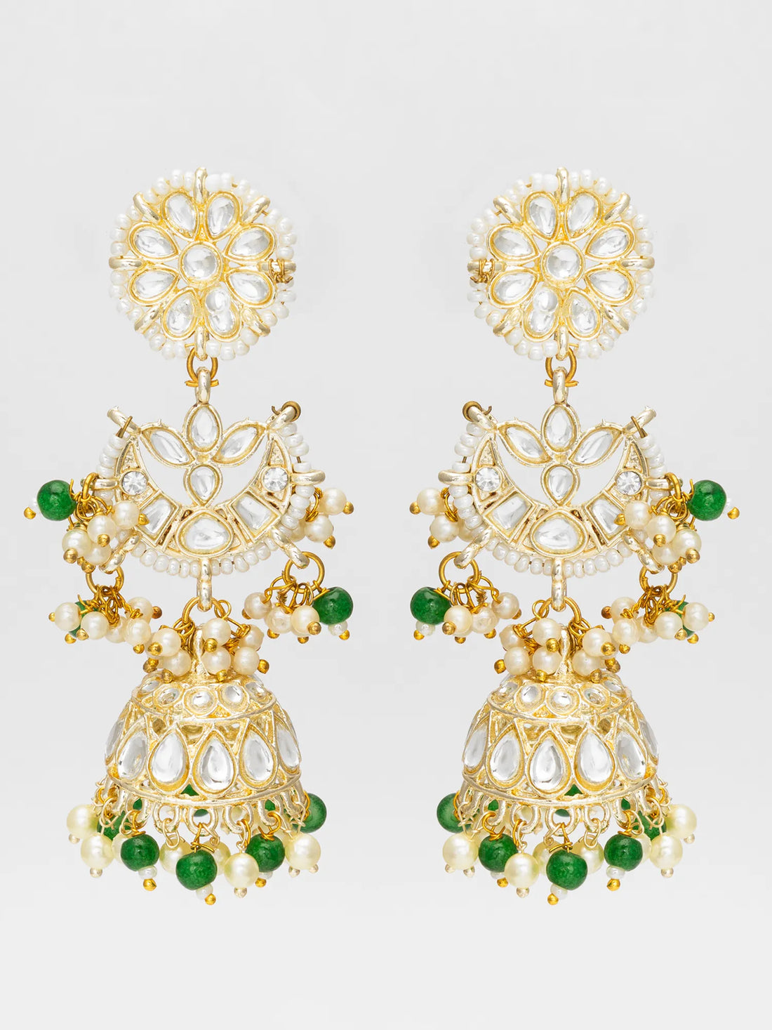 Jhumka Earrings On A Red Background