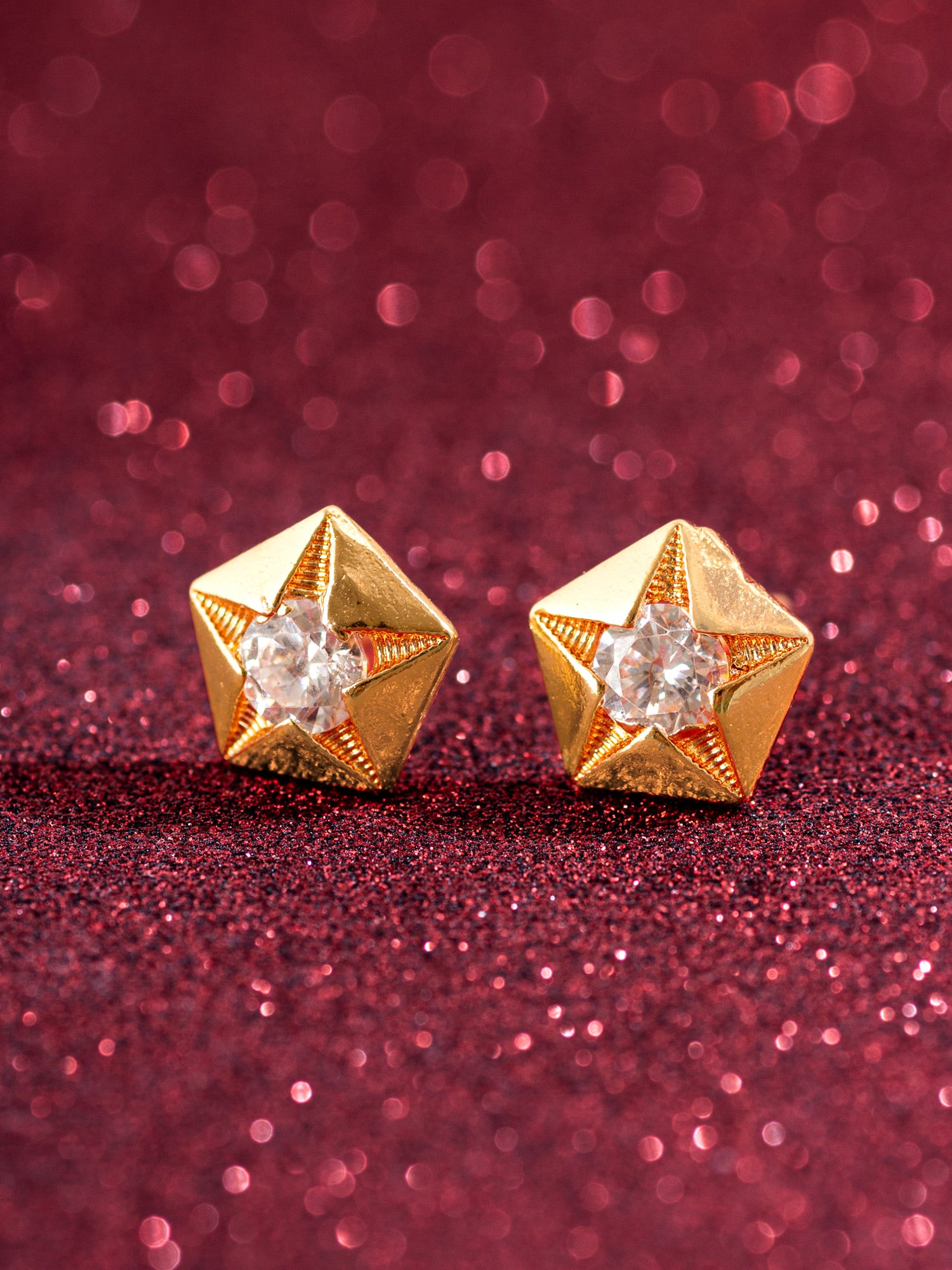 Aadita Gold Plated Star Shaped AD Stud Earrings